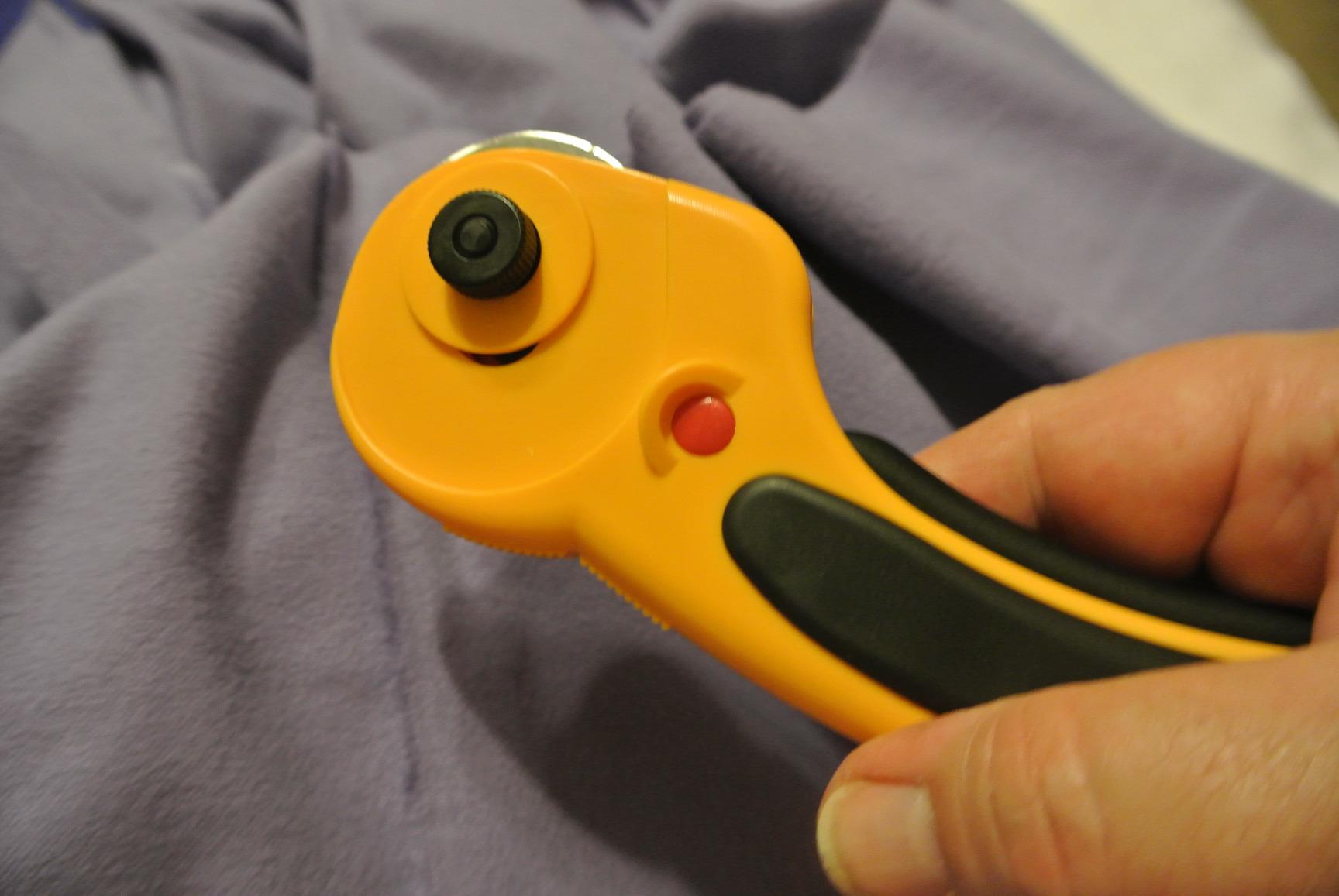 OLFA 45mm Ergonomic Rotary Cutter (RTY-2/DX) - Rotary Fabric Cutter w/Blade Cover & Squeeze Trigger for Quilting, Sewing, Crafts, Replacement Blade: OLFA RB45-1H customer photo 1