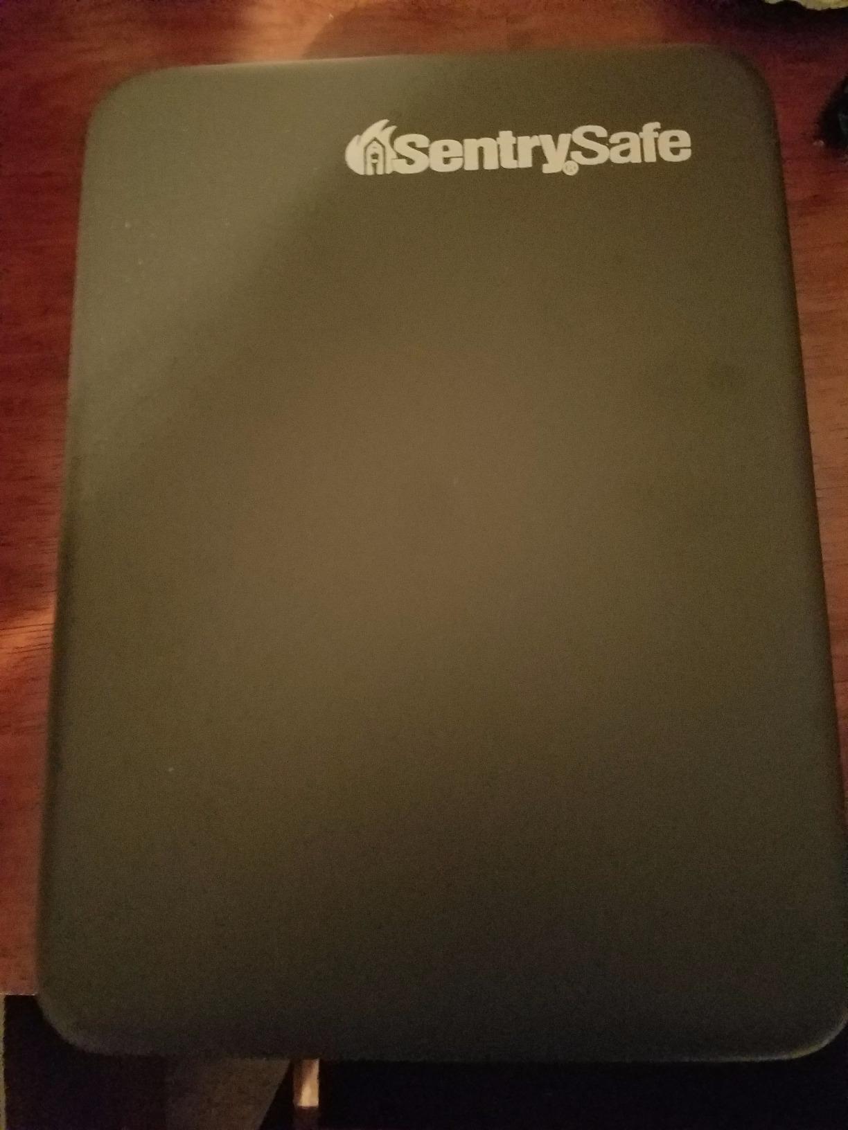 SentrySafe Small Safe, Black Lock Box with Combination Lock for Office or Dorm Secures Money, Passport, Jewelry, 0.05 Cubic Feet, Exterior: 2.6 in. H x 5.9 in. W x 8.0 in. D, P005C customer photo 1