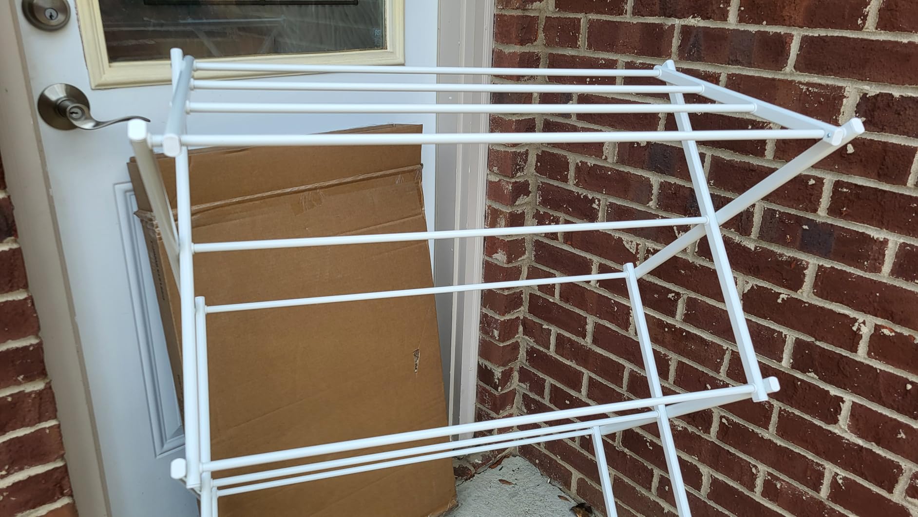 Amazon Basics Foldable Portable Metal Clothes Drying Rack for Indoor Air Drying, Energy Saving, 14.5 x 29.5 x 41.8 inches, Chrome Silver customer photo 1