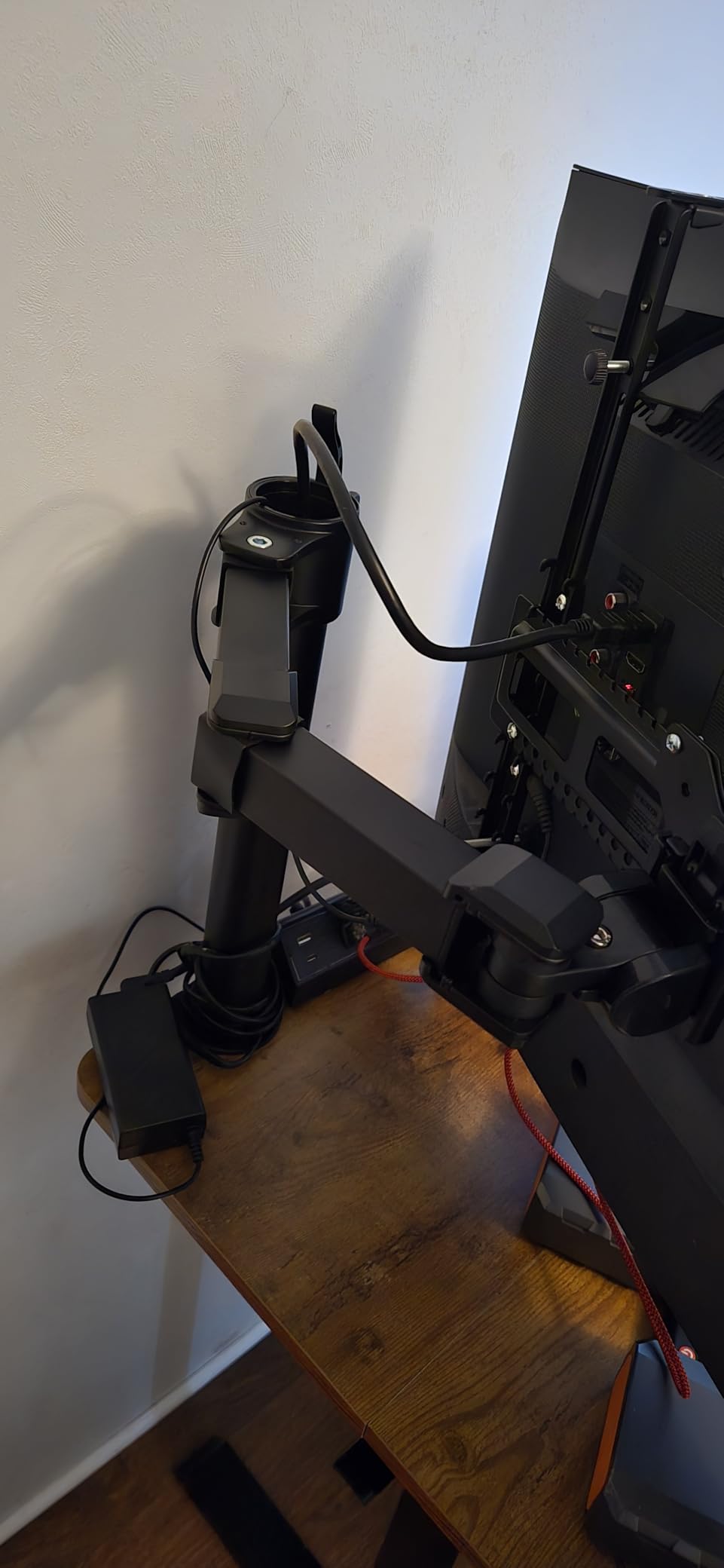 Amazon Basics Single Computer Monitor Stand with Cable Management, Height Adjustable VESA Desk Arm Mount, Fully Adjustable Tilt and Rotation, Steel, Black customer photo 2