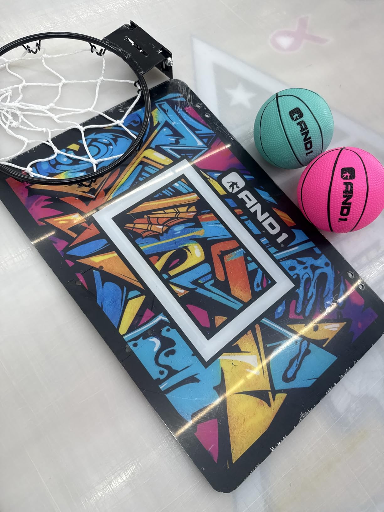AND1 Over the Door Mini Basketball Hoop: 18x12 Shatterproof Backboard, 2 Mini Basketballs, and Hand Pump Included- Ultimate Indoor Basketball Accessory for Kids and Adults, No Tools Required customer photo 2