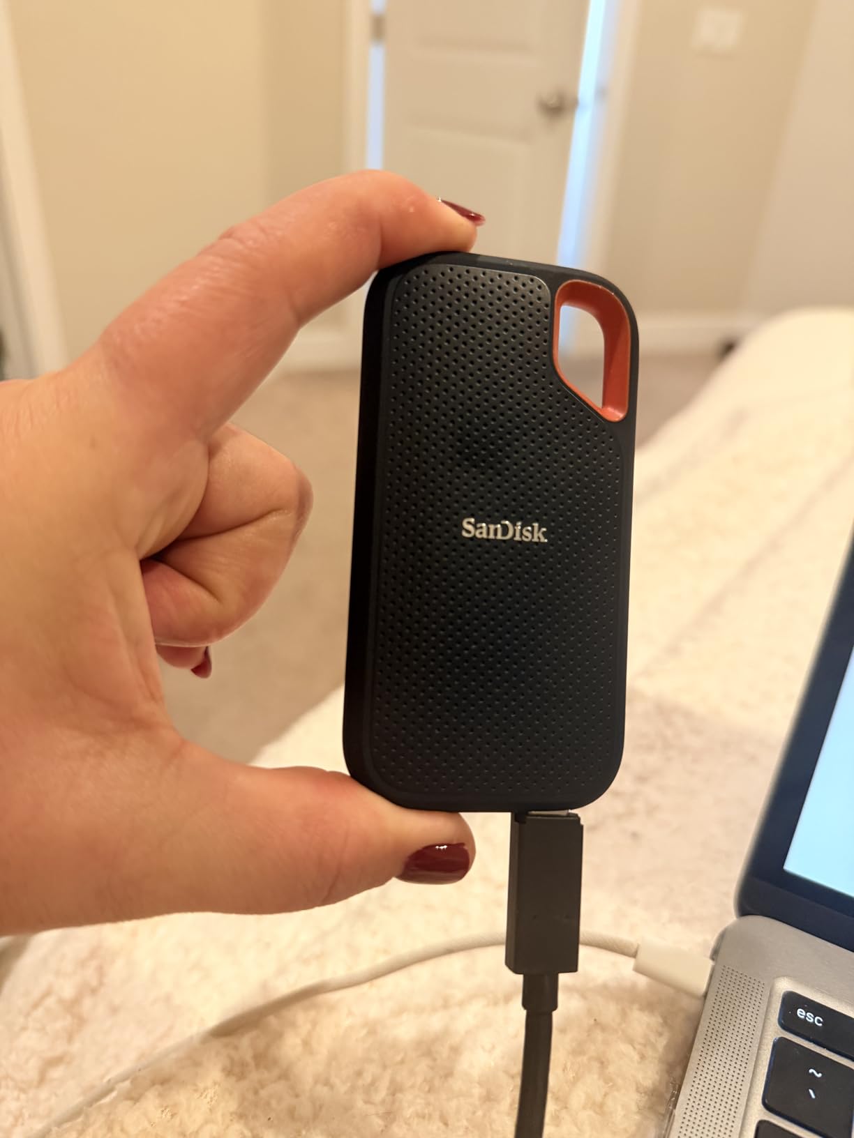 SanDisk 2TB Extreme Portable SSD - Up to 1050MB/s, USB-C, USB 3.2 Gen 2, IP55 Water and Dust Resistance, Updated Firmware - External Solid State Drive - SDSSDE61-2T00-G25 customer photo 2