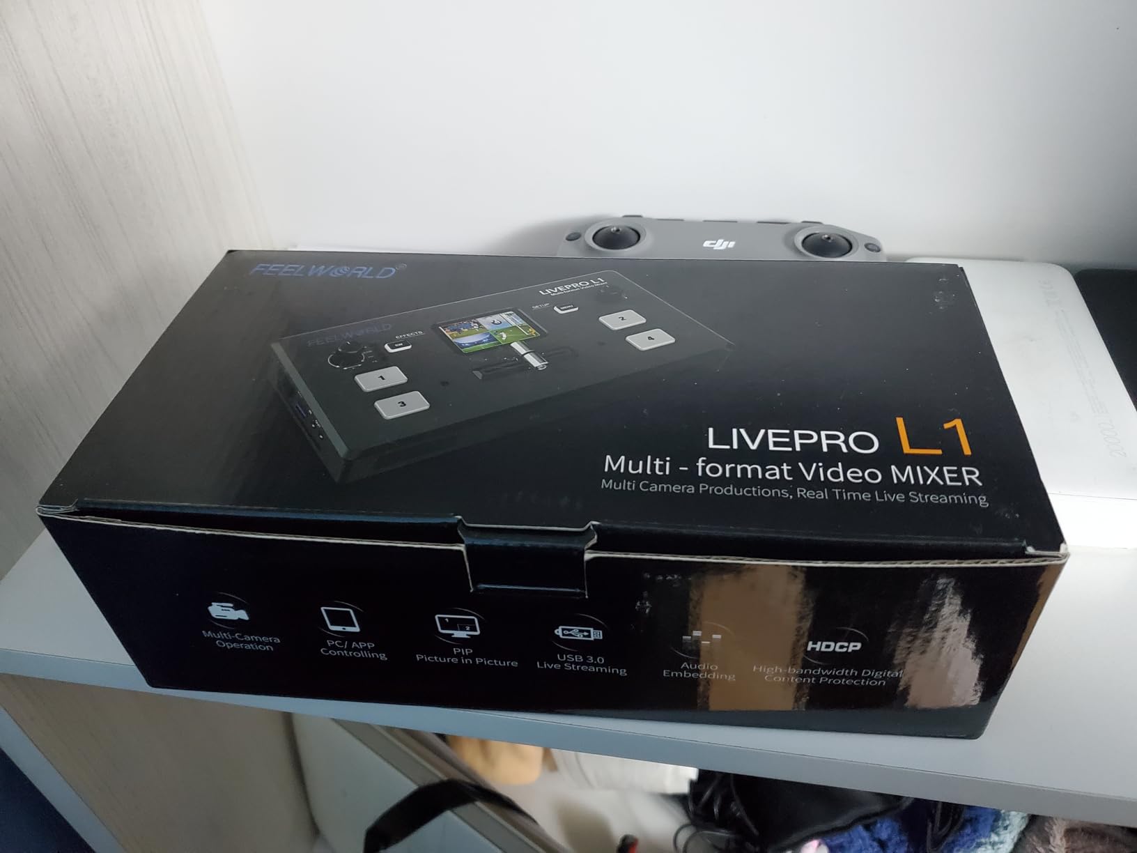 FEELWORLD LIVEPRO L1 V1 Multi Camera Video Mixer Switcher 2 Inch LCD Display 4 x HDMI Inputs USB 3.0 Output Format Real Time Production Live Streaming Lightweight customer photo 1