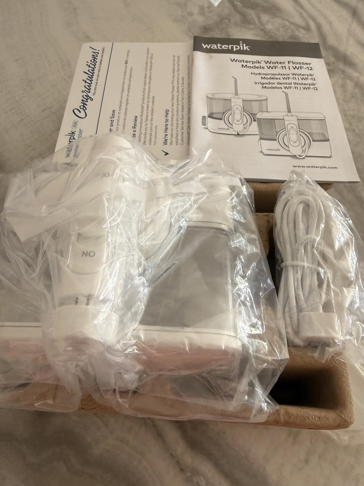 Waterpik ION Professional Water Flosser, Rechargeable and Portable for Teeth, Gums, Braces, 10 Settings, 7 Flossing Tips For Multiple Users And Needs, ADA Accepted, WF-12 White customer photo 2