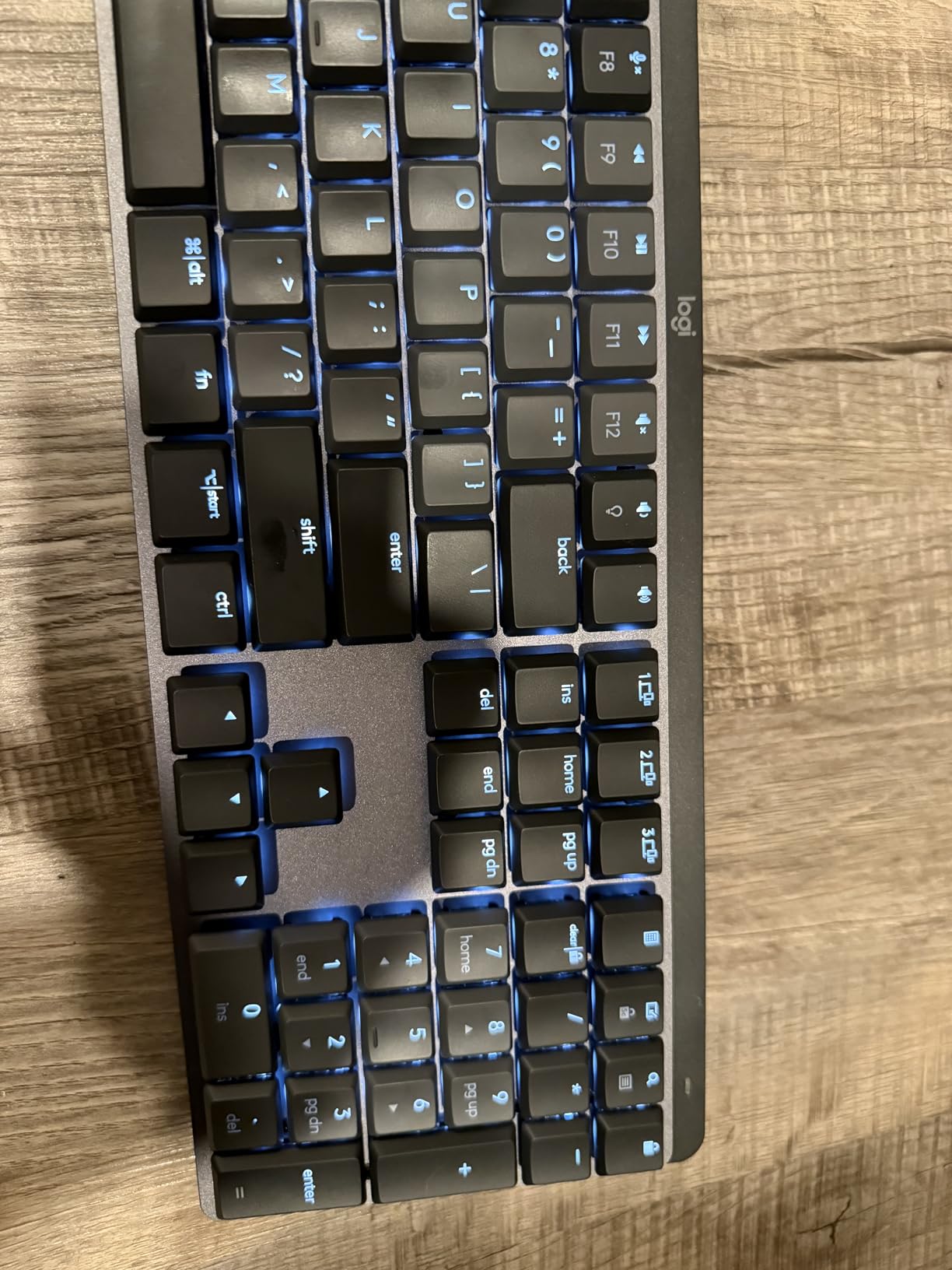 Logitech MX Mechanical Wireless Illuminated Performance Keyboard, Tactile Quiet Switches, Backlit Keys, Bluetooth, USB-C, macOS, Windows, Linux, iOS, Android, Metal, Graphite customer photo 1