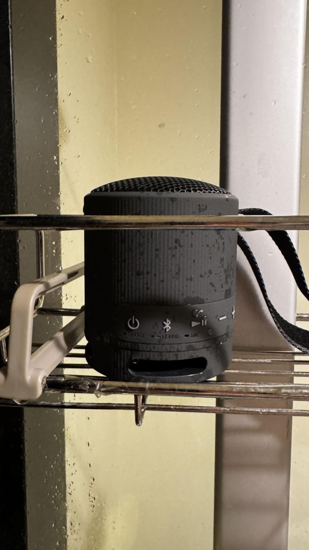 Sony SRS-XB100 Wireless Bluetooth Portable Lightweight Super-Compact Travel Speaker, Durable IP67 Waterproof & Dustproof Shower Speaker, 16 Hour Battery, Versatile Strap, & Hands-free Calling, Black customer photo 1