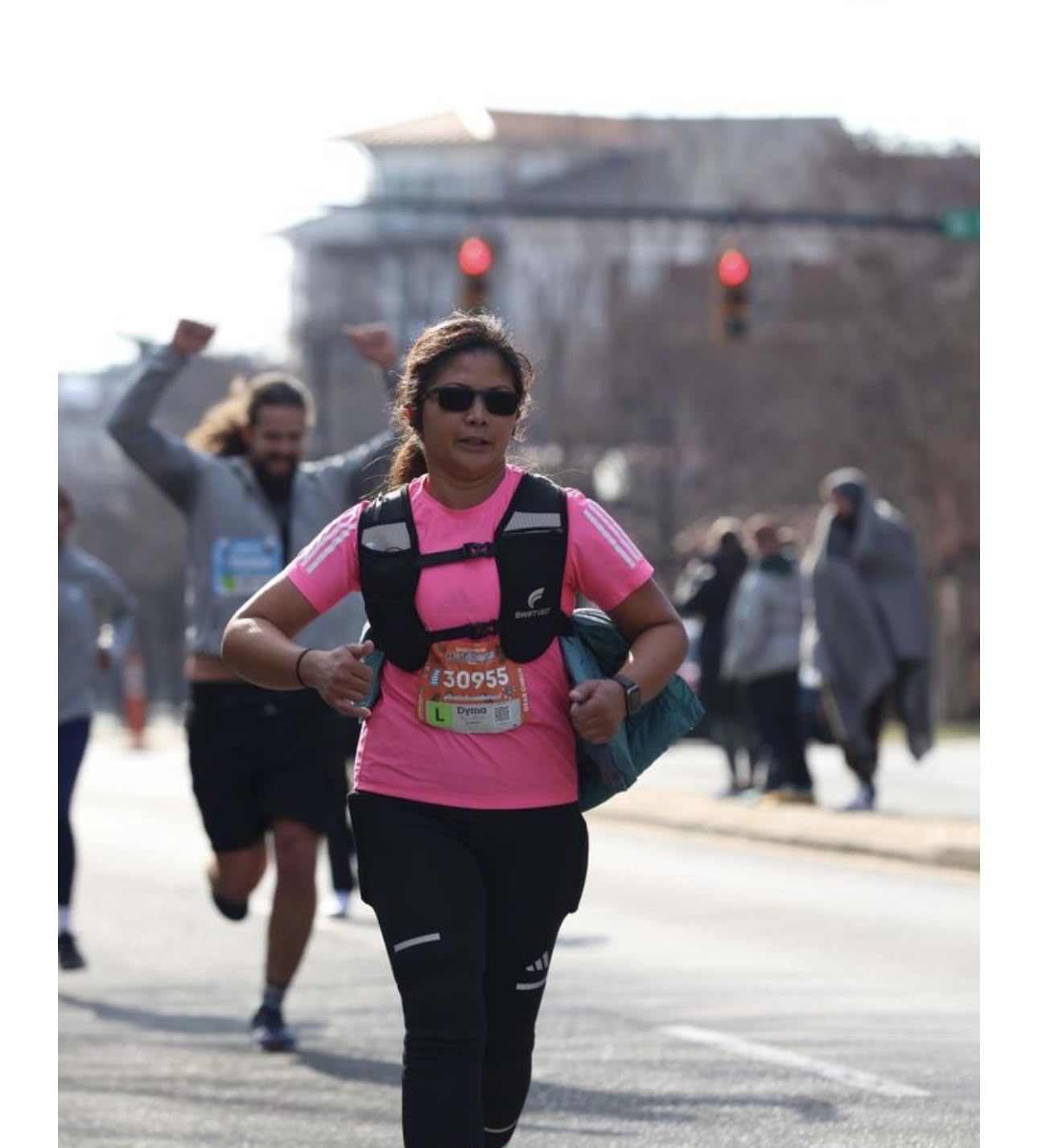 Running Phone Holder Vest with 500ml/17oz Water Bottle | Reflective Hydration Vest | Adjustable | Light | 6 Pockets for Running Accessories | Unisex customer photo 1