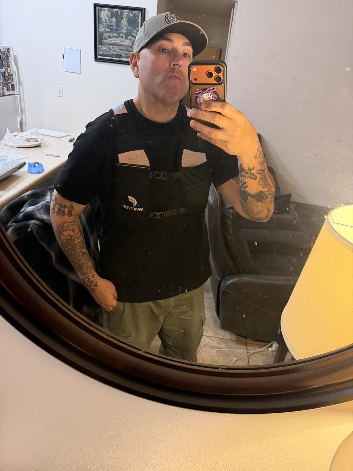 Running Phone Holder Vest with 500ml/17oz Water Bottle | Reflective Hydration Vest | Adjustable | Light | 6 Pockets for Running Accessories | Unisex customer photo 2