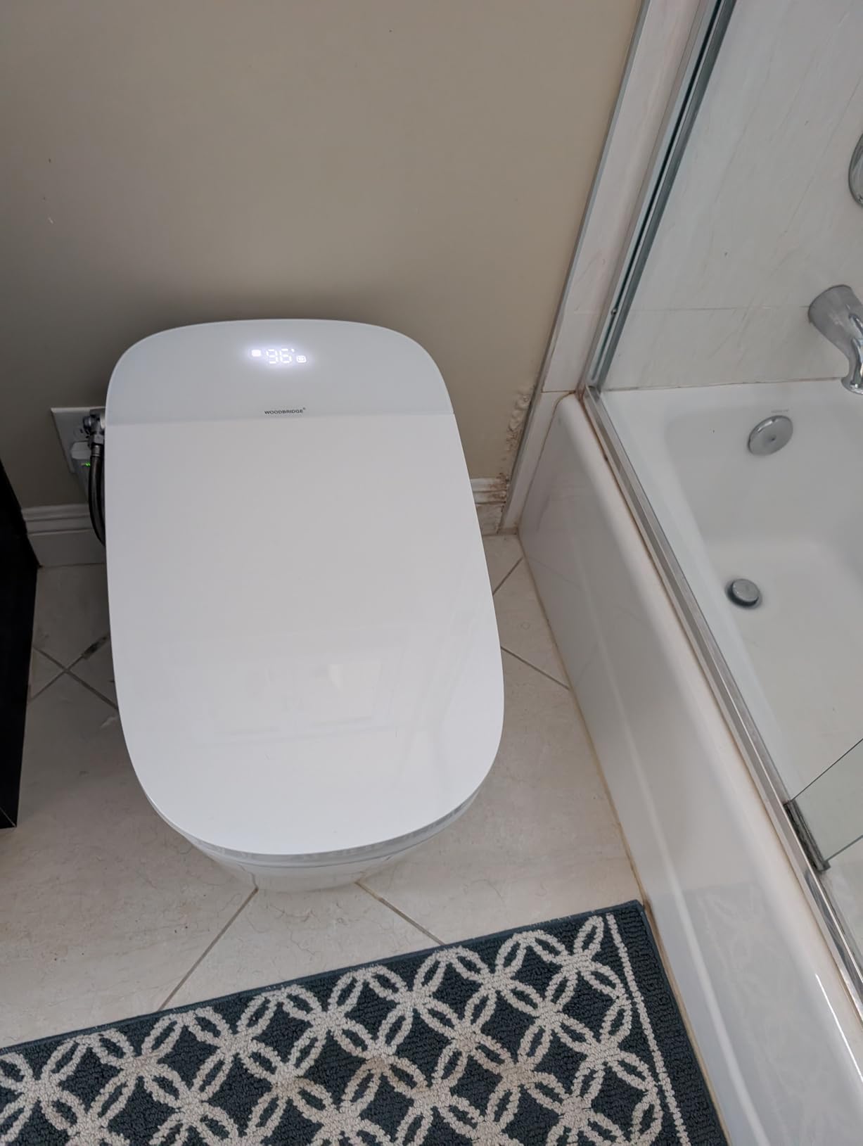 WOODBRIDGE Smart Toilet with Voice Control, 1000g MaP Flush Score, Foam Shield, Moving Dryer, Blackout Flush, ADA Comfort Height, Auto Open & Close, Heated Seat, B0931S customer photo 1