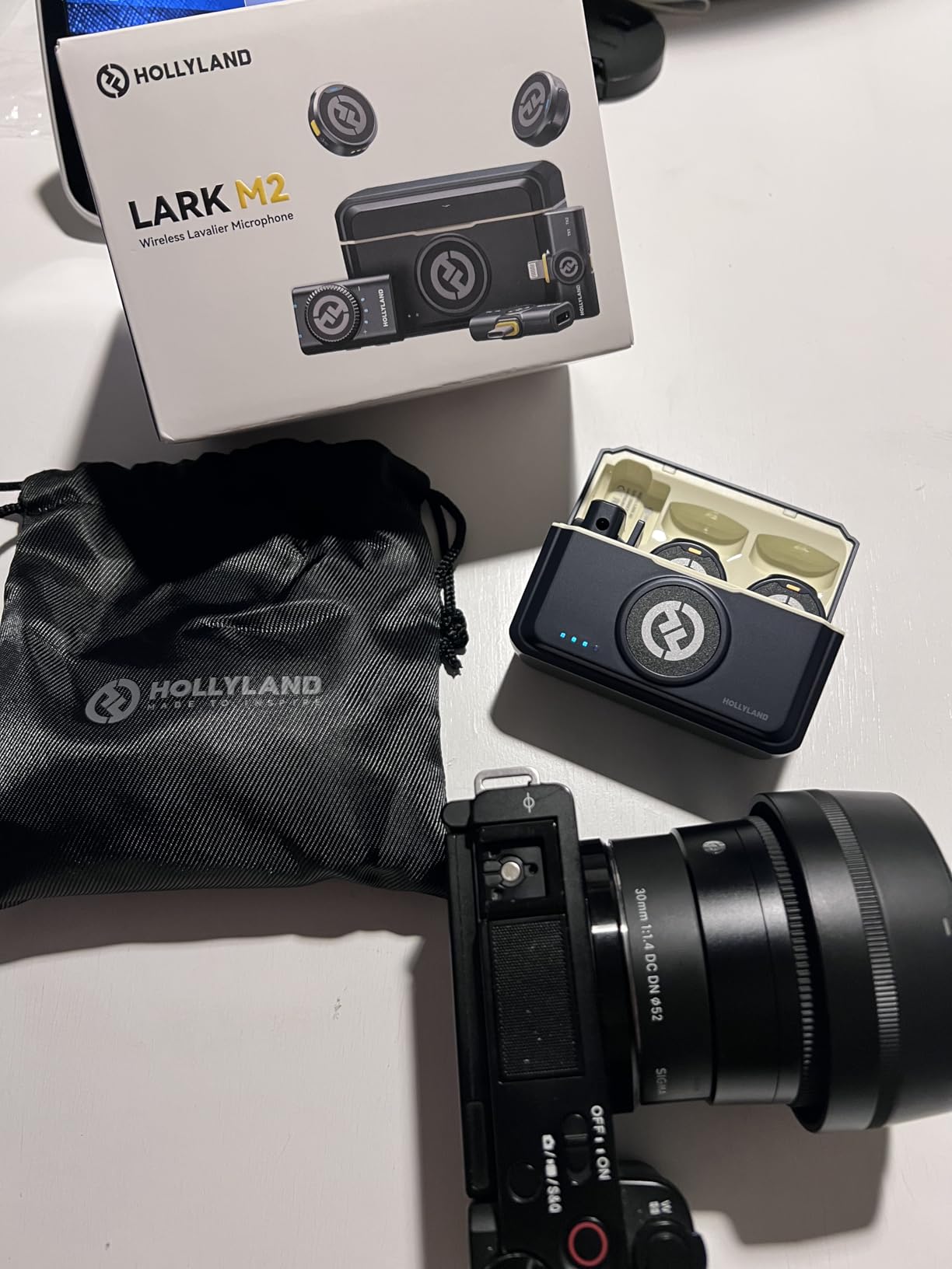 Hollyland Lark M2 Wireless Microphone for iPhone/Camera/Android/PC, 48kHz/24-bit High Fidelity Audio, 300m Range, Noise Cancelling, 40h Use, YouTube, Vlog, Streaming (2TX + 3RX + Charging Case) customer photo 1