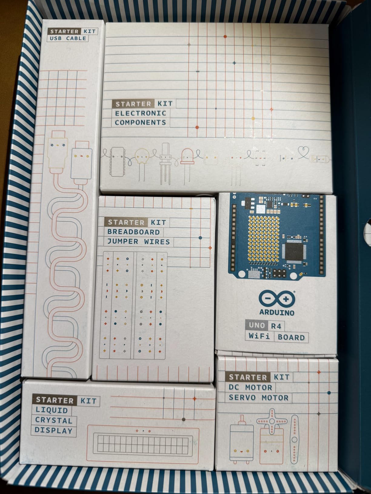 Arduino Starter Kit R4 [K000007_R4] - Learn Electronics and Coding with The UNO R4 WiFi Board, 13 Guided Projects in a Printed Book + Growing Resources Online, Official Certification Voucher customer photo 2