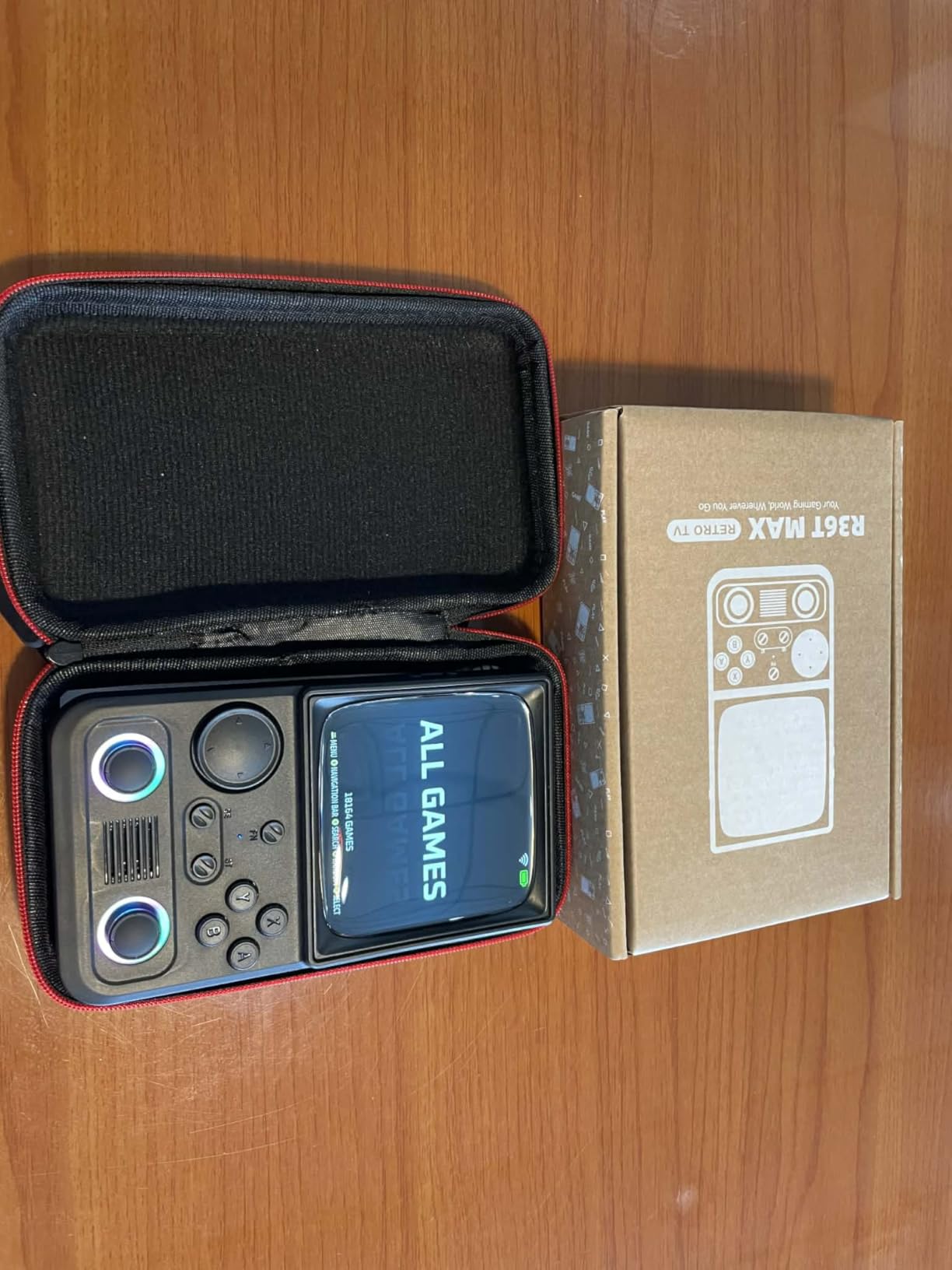 R36TMAX Retro Handheld Game Console, 4.0'' 720x720 IPS Screen, 64GB Supports 18000+ Classic Games, EmuELEC System Supports WiFi Networked Fighting and OTG, 4000mAh, with Portable Case(Black 64GB) customer photo 1