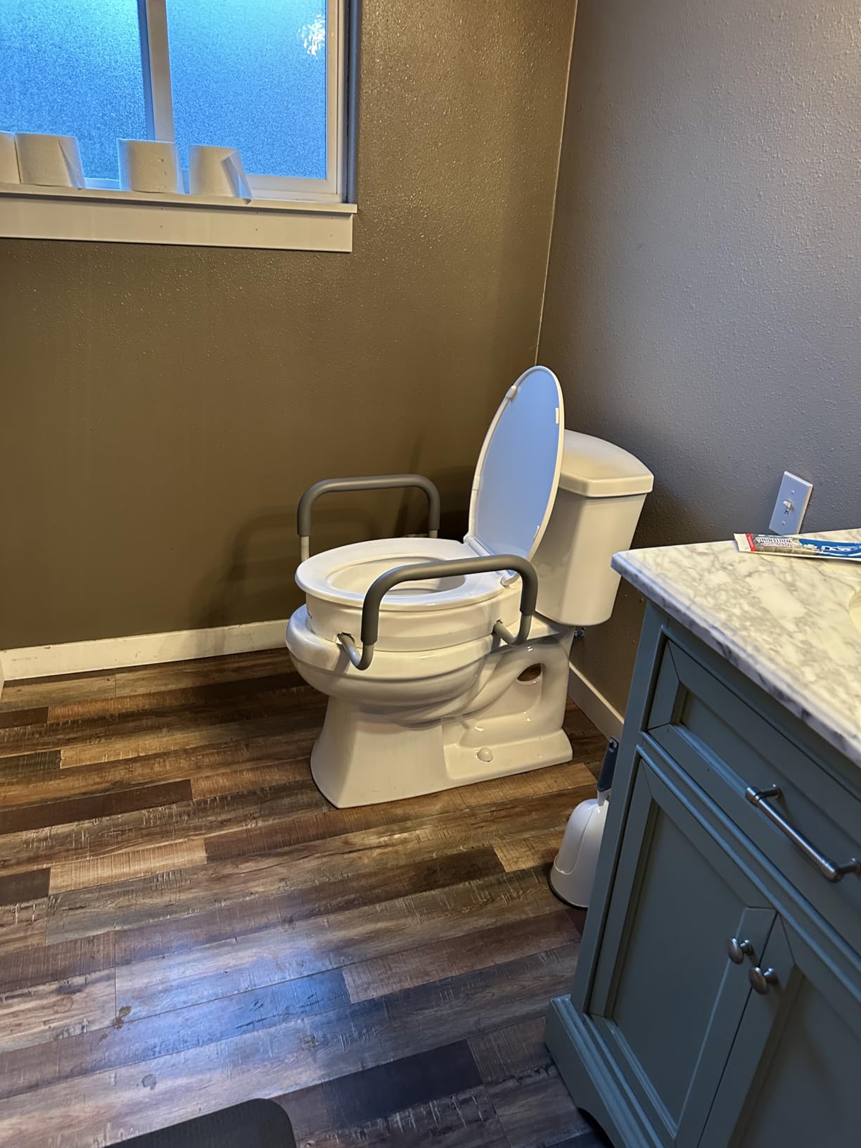 Carex 3.5 Inch Raised Toilet Seat with Arms, Elongated Toilet Seat Riser, Up to 250 lbs Capacity, Elevating & Raising Seat for Elderly & Handicap, Universal, Slip-Resistant with Padded Handles, White customer photo 1