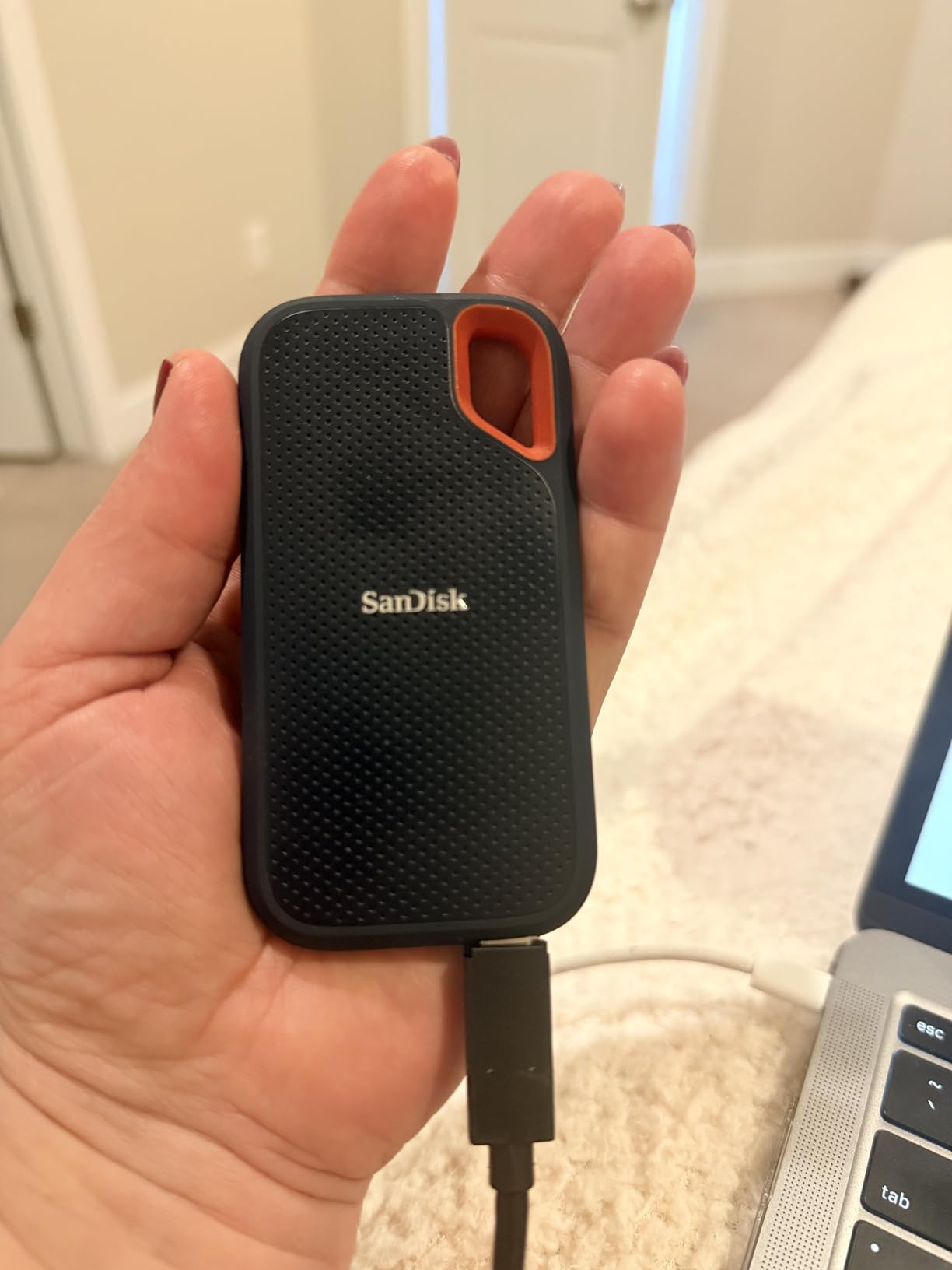 SanDisk 500GB Extreme Portable SSD - Up to 1050MB/s, USB-C, USB 3.2 Gen 2, IP65 Water and Dust Resistance, Updated Firmware - External Solid State Drive - SDSSDE61-500G-G25 customer photo 2