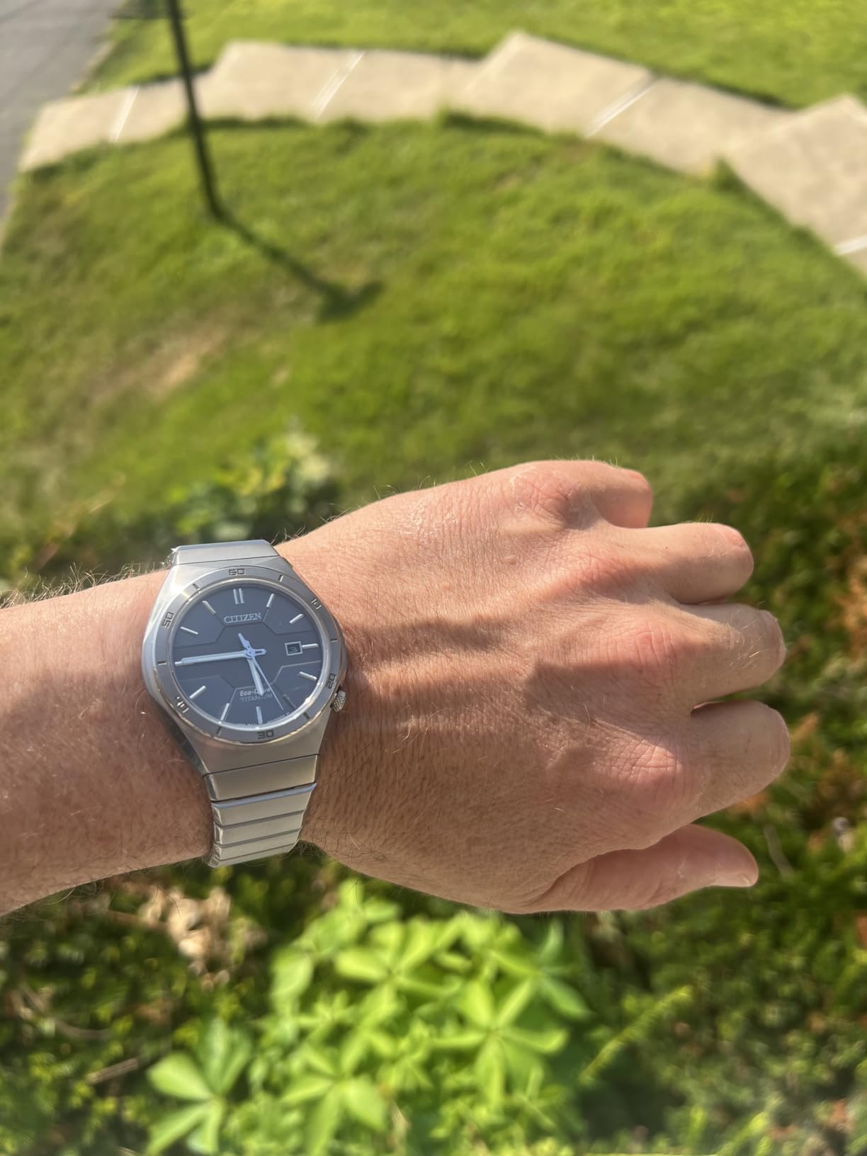 Citizen Men's Eco-Drive Sport Luxury Armor Watch in Super Titanium, Black Dial (Model: AW1660-51H) customer photo 1