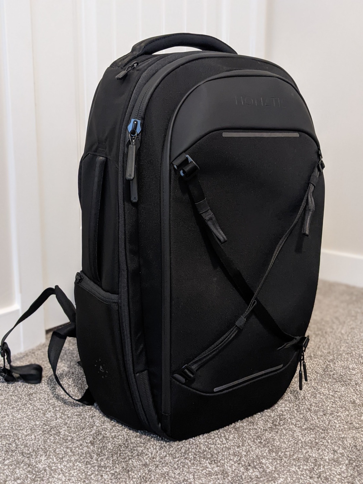 NOMATIC Navigator Travel Backpack - 32L Backpack with Laptop Compartment and 9L Built-In Expansion - Anti-Theft Carry-On Backpack for Travel - Water Resistant Travel Pack (Black) customer photo 1