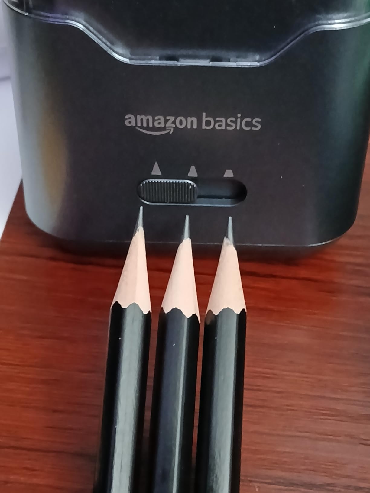 Amazon Basics Portable Electric Pencil Sharpener, Easy to Use, Versatile, Helical Blade, Auto Stop, Battery/USB Cord Operated, Black, 2.87 x 2.87 x 5.3 in customer photo 1