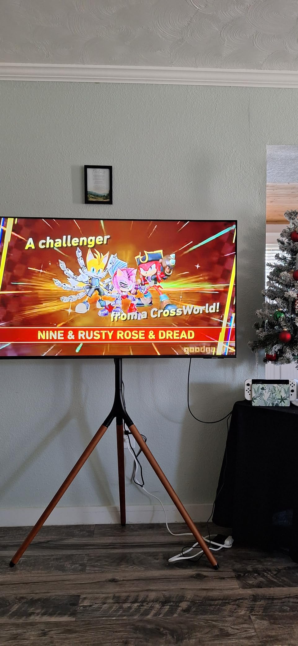 UPGRAVITY Easel TV Stand with Tripod Base for 45-65 inch Flat Screen up to 77lbs, Height Adjustable TV Stand Tripod for Living Room w/Cable Ties, 180 Swivel, Black customer photo 2