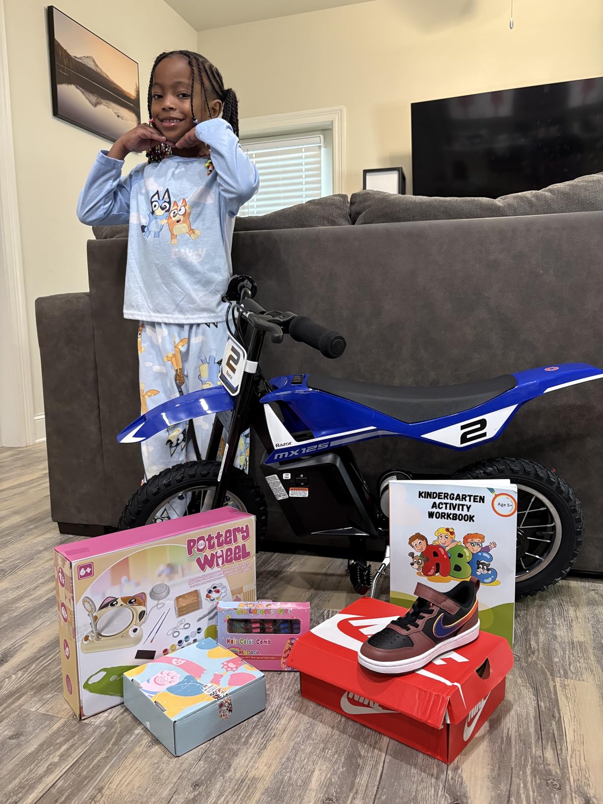 Razor MX125 Dirt Rocket Electric-Powered Bike with Authentic Motocross Geometry, Rear-Wheel Drive,100-watt, high-Torque, Chain-Driven Motor, for Kids 7+, Blue customer photo 2