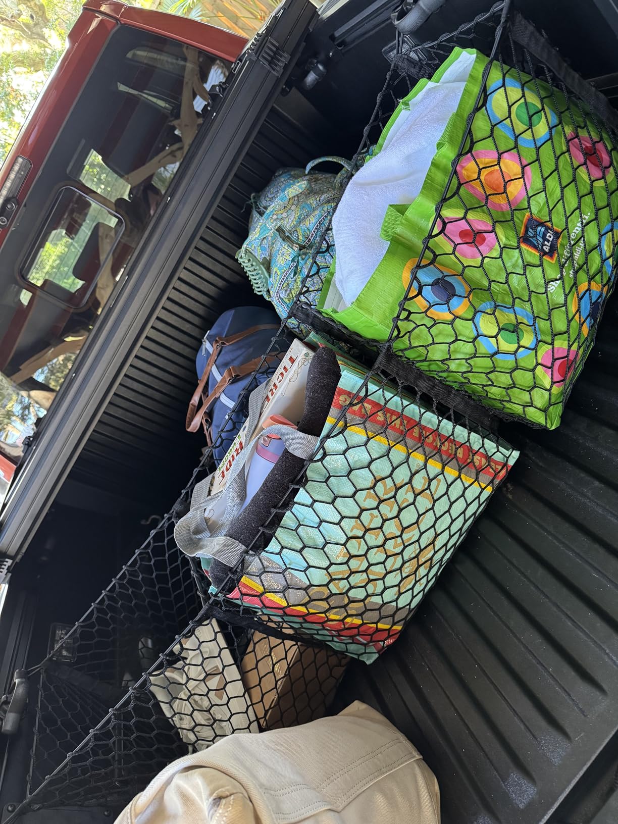 Three Pocket Cargo Net for 2005-2026 Toyota Tacoma - Patented Design - Premium Truck Bed Organizers & Storage - Grocery Holder - Designed in USA customer photo 1