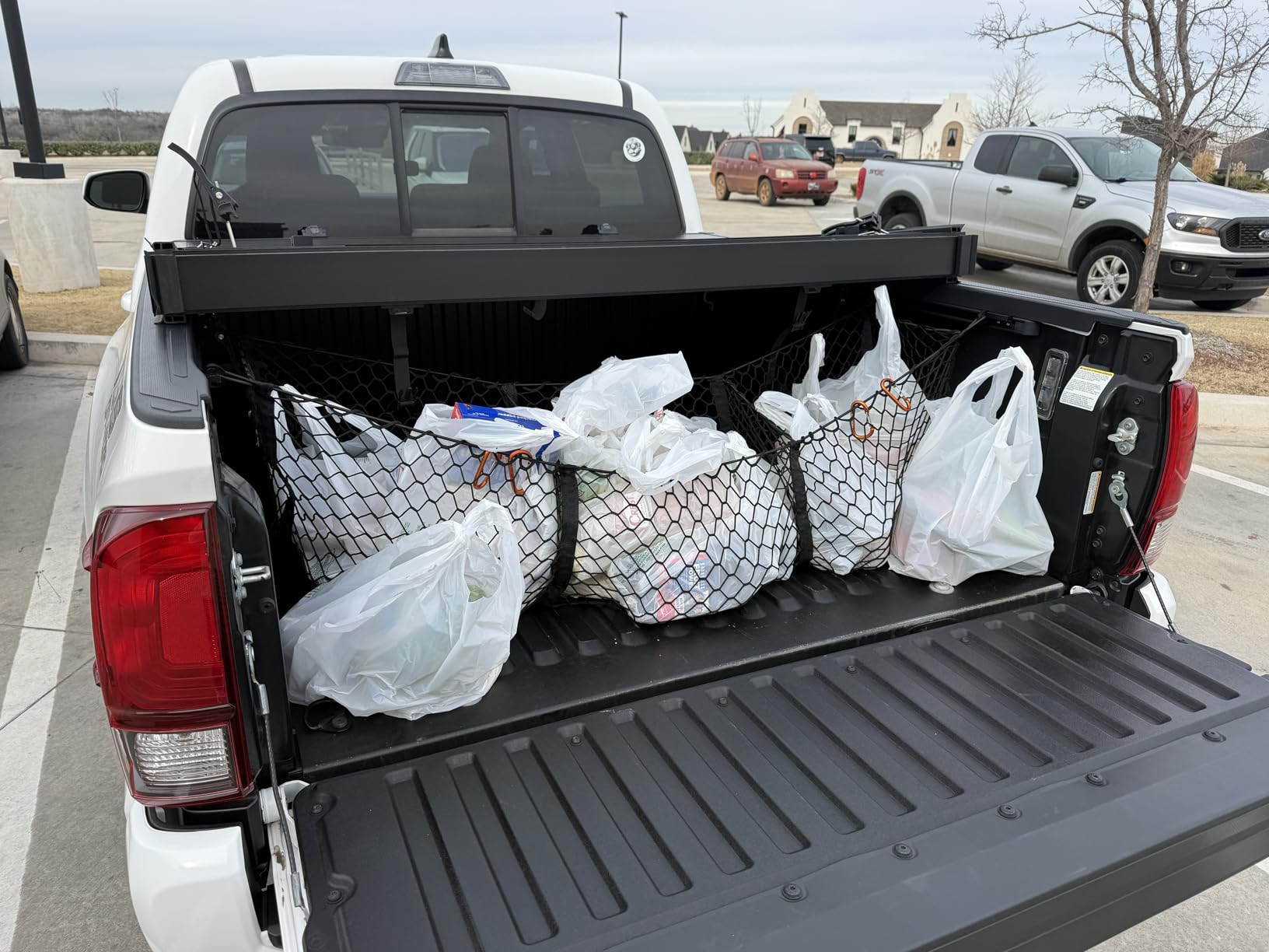 Three Pocket Cargo Net for 2005-2026 Toyota Tacoma - Patented Design - Premium Truck Bed Organizers & Storage - Grocery Holder - Designed in USA customer photo 2