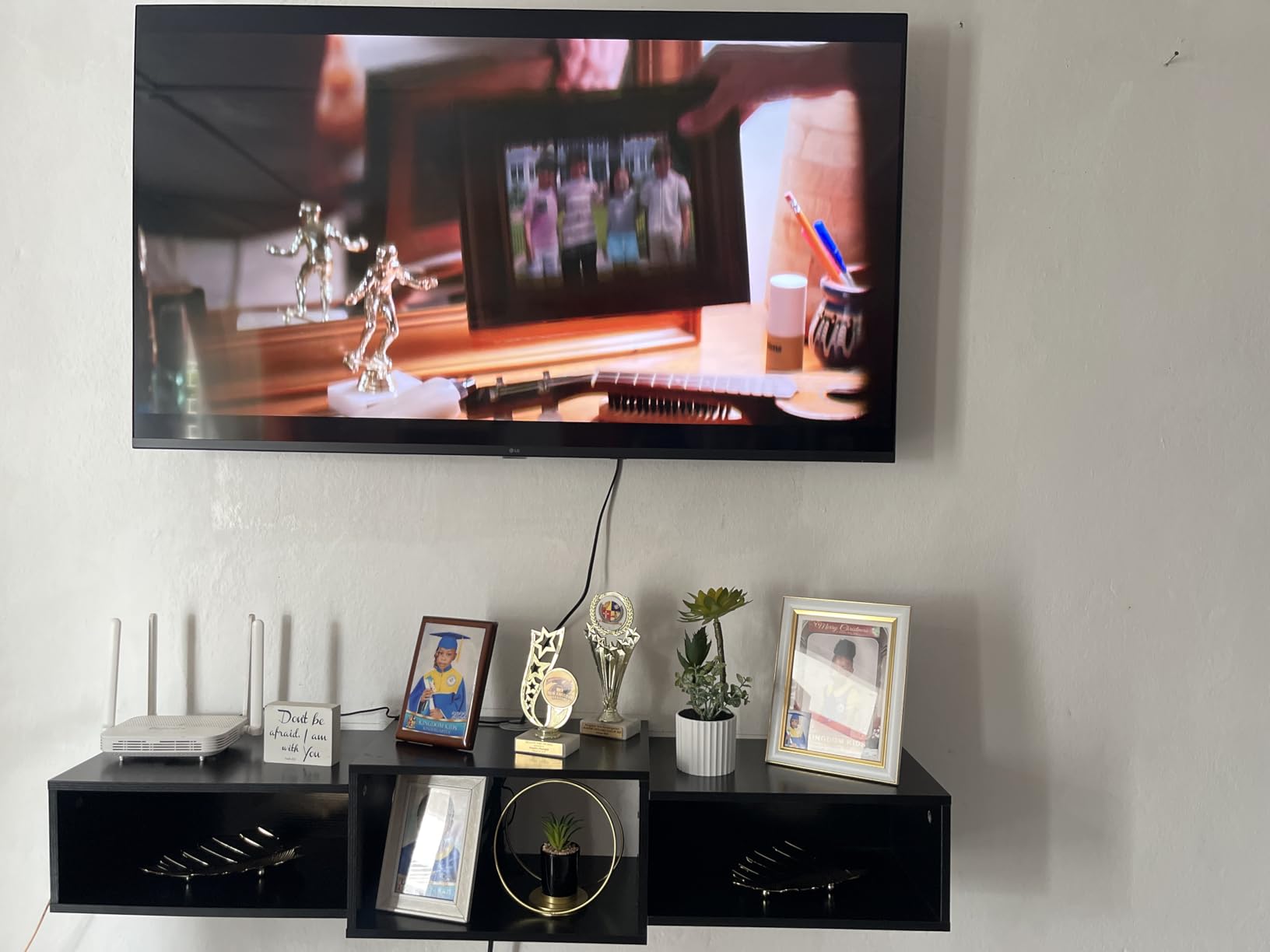 IBUYKE Floating TV Stand Wall Mounted with Power Outlet,Modern Wood Wall Mounted Media Console Shelf,Floating Entertainment Center for Under TV Storage for Living Room Bedroom Office,Black WST001B- customer photo 2