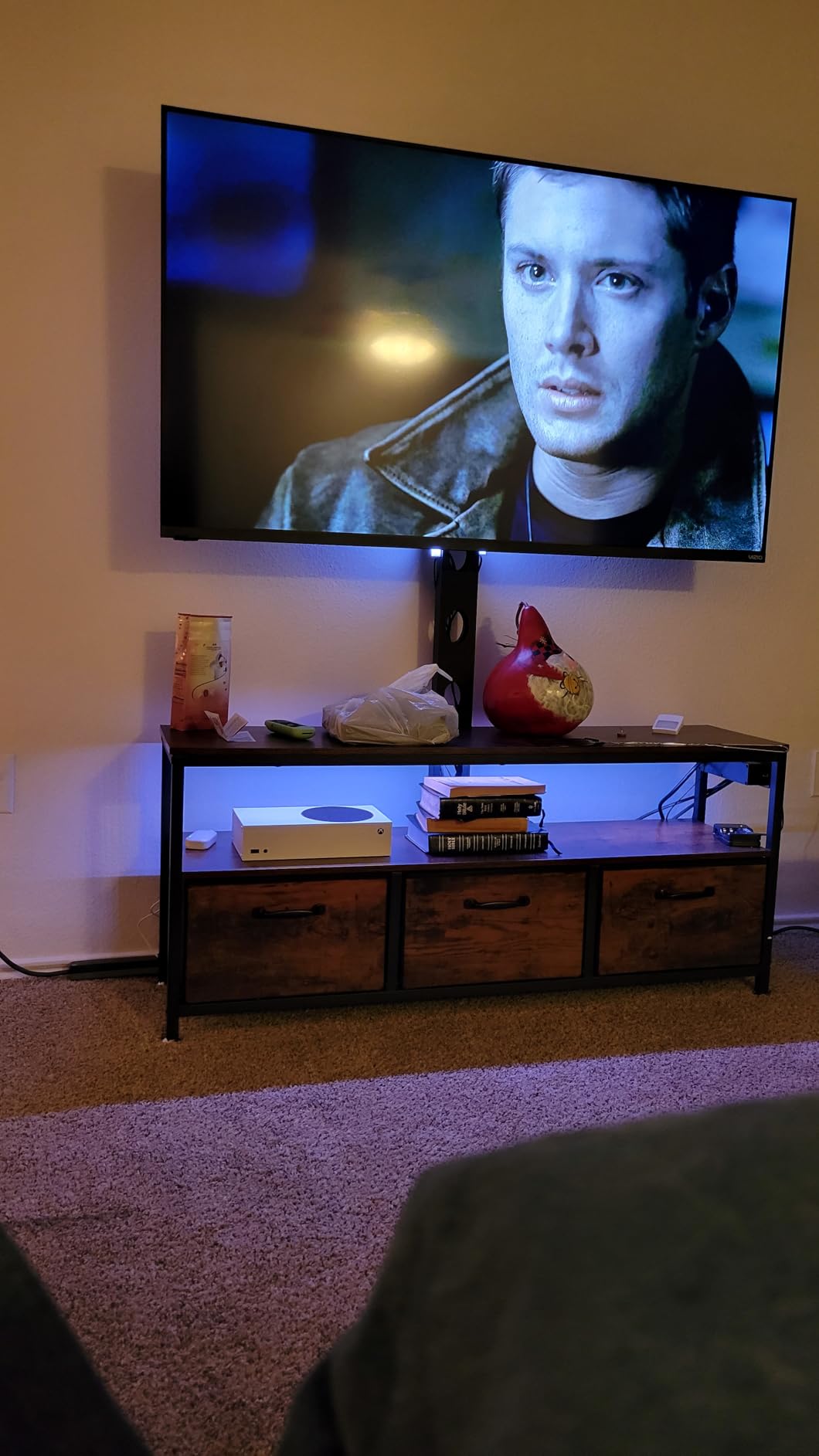 JUSTOGO TV Stand with Mount and Power Outlet, TV Stand Mount with Storage for Living Room, Entertainment Center with LED Lights for 45 55 60 65 inch, Height Adjustable Media Console, Black customer photo 1