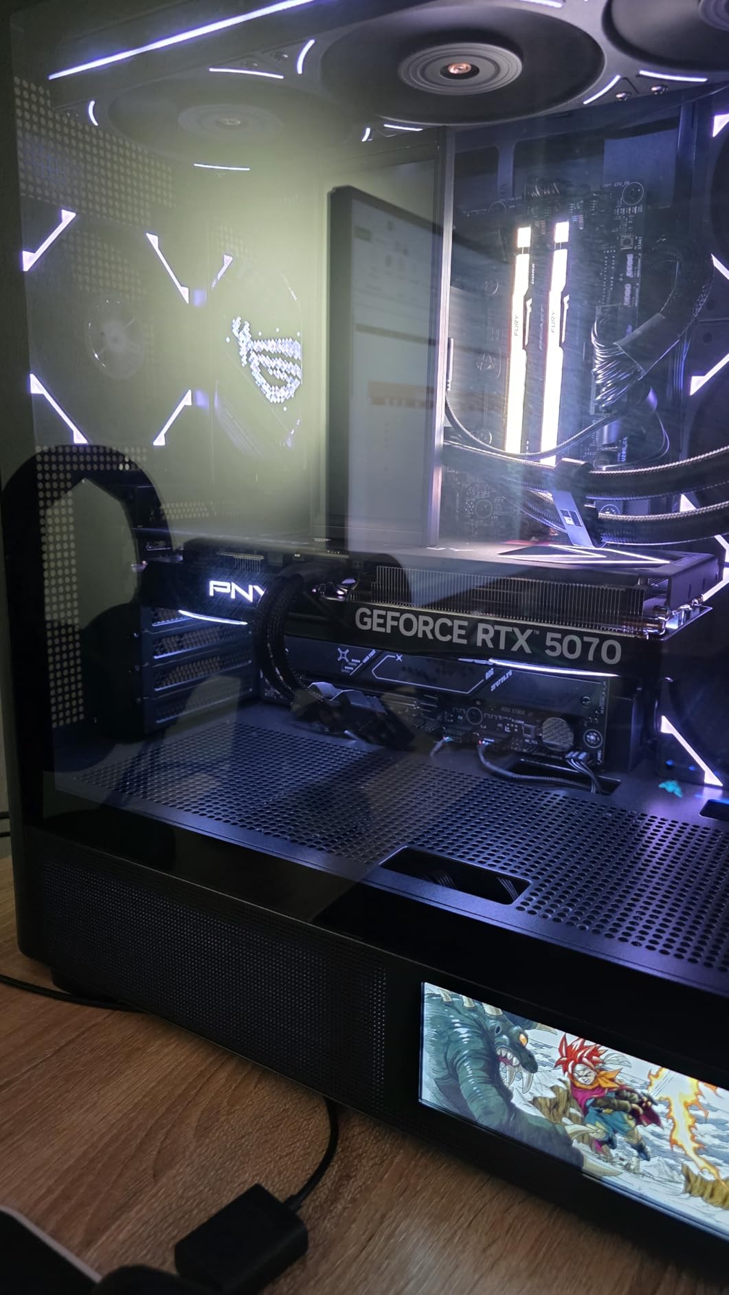 PNY NVIDIA GeForce RTX 5070 Epic-X ARGB OC Triple Fan, Graphics Card (12GB GDDR7, 192-bit, Boost Speed: 2685 MHz, SFF-Ready, PCIe 5.0, HDMI/DP 2.1, 2.4-Slot, Blackwell Architecture, DLSS 4) customer photo 1