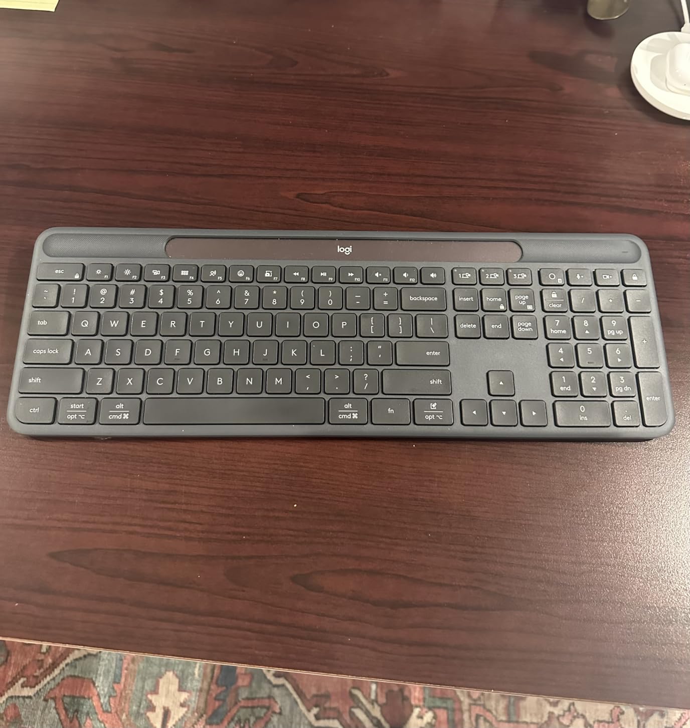 Logitech Signature Slim Solar+ Wireless Bluetooth Keyboard K980, Solar and Artificial Light Powered, Up to 10 Years Battery Life, Customizable Keys - Graphite customer photo 1