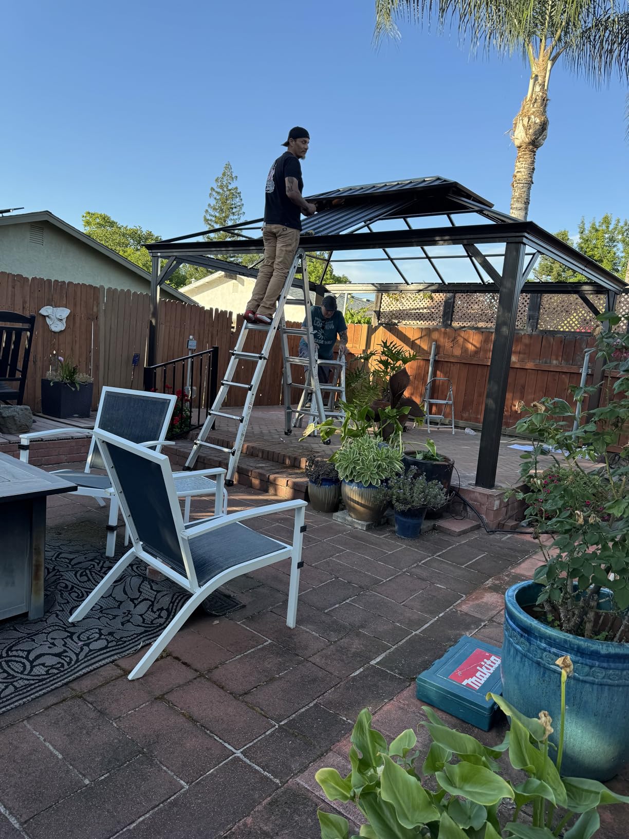 Kozyard Alexander 12' X 16' Hardtop Aluminum Permanent Gazebo with a Mosquito Net and Privacy Sidewalls, Permanent Gazebo Pavilion for Patio, Backyard (Brown) customer photo 1
