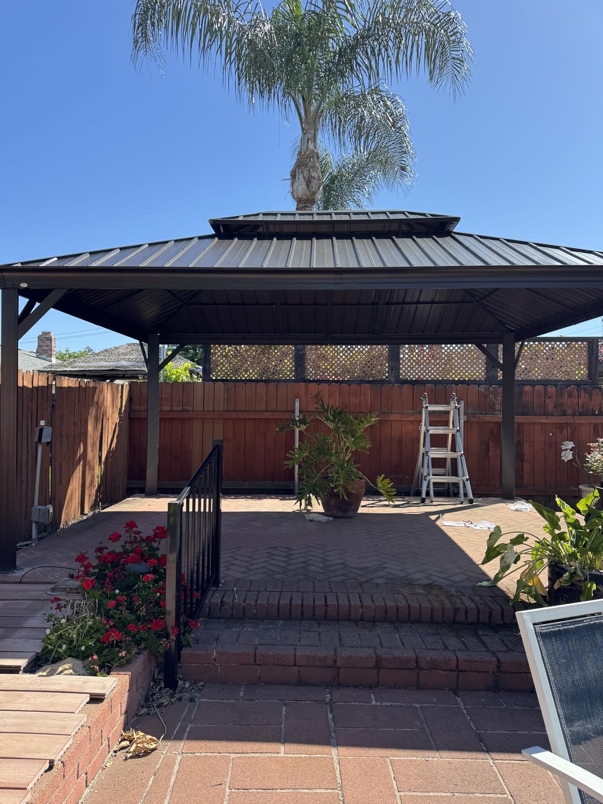 Kozyard Alexander 12' X 16' Hardtop Aluminum Permanent Gazebo with a Mosquito Net and Privacy Sidewalls, Permanent Gazebo Pavilion for Patio, Backyard (Brown) customer photo 2