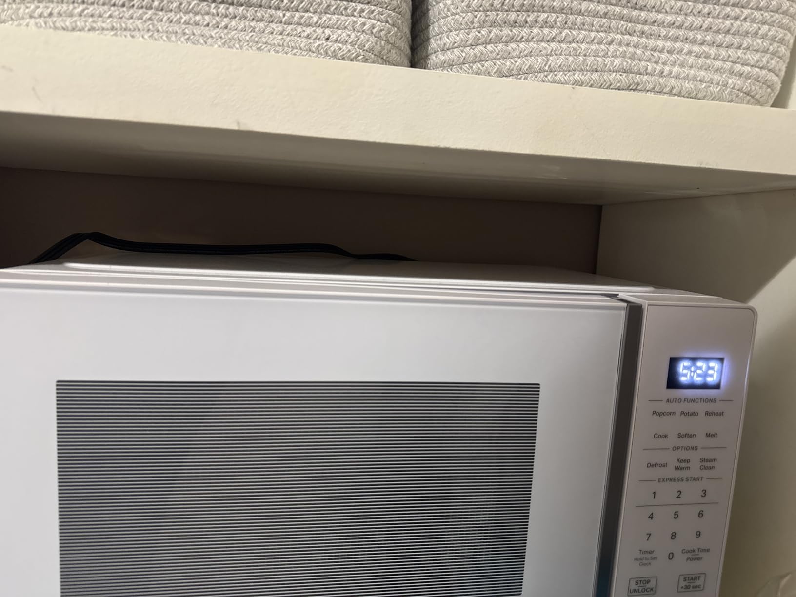WHIRLPOOL WMCS3018RW Countertop Microwave with Turntable 0.7 Cu. Ft, Steam Clean, 700 Watt Microwave, White customer photo 1