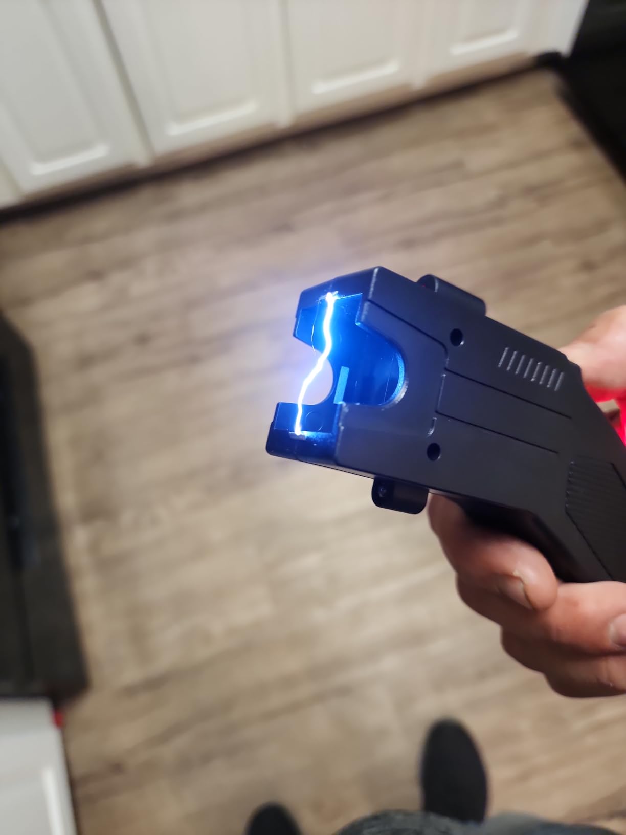 GOAEO Self-Defense Heavy Duty Stun Gun for Men & Women,15 Foot Range,1.80 uC Painful Charge,LED Flashlight,Safety Switch customer photo 1