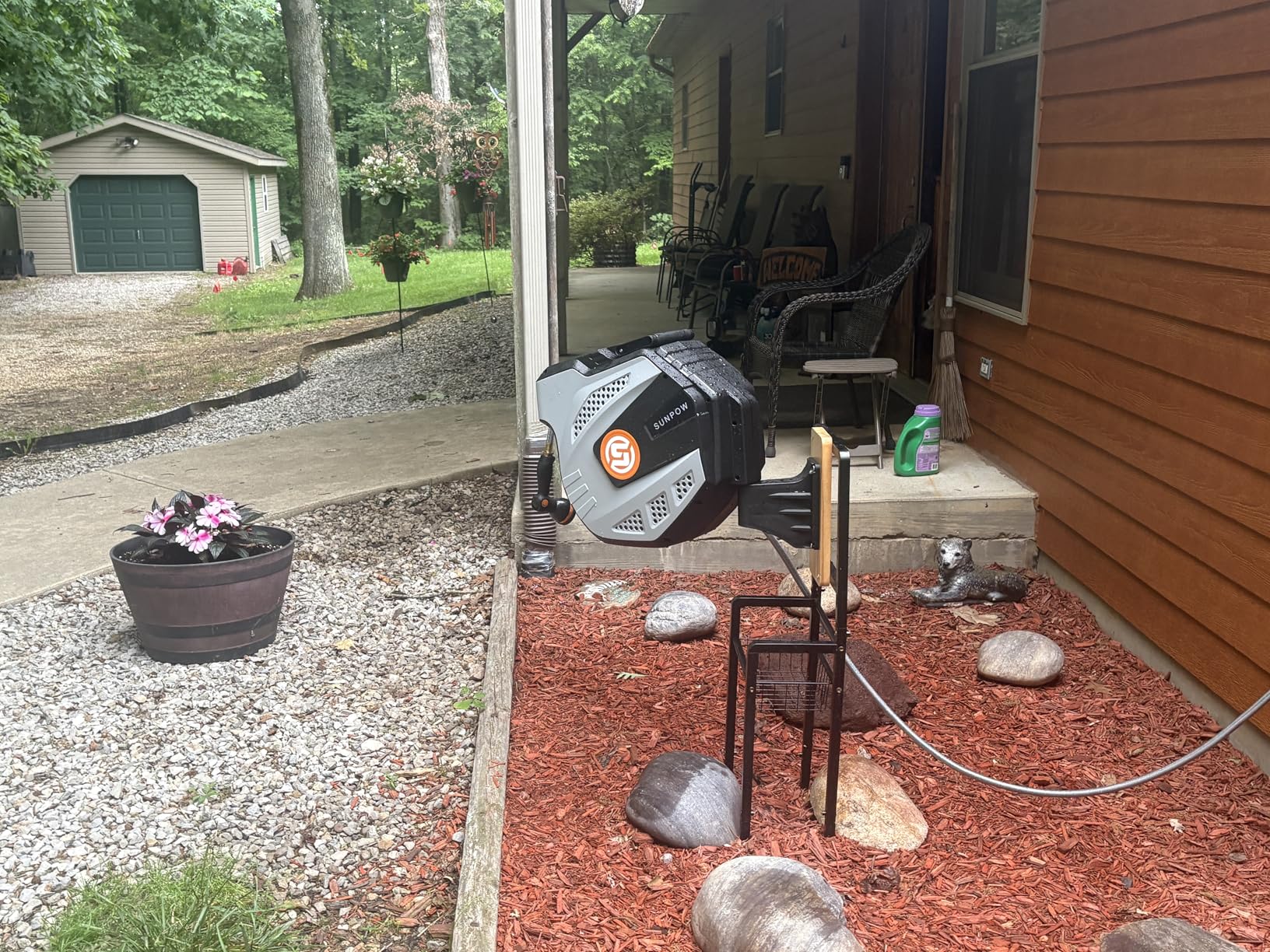 SUNPOW Retractable Garden Hose Reel - 1/2 inch x 50ft Heavy Duty Wall Mounted Hose Reel with 3/4 inch Brass Fitting and 10 Sprayer Nozzle - Any Length Lock, Auto Rewind System, 180 Degree Swivel Bracket - Grey customer photo 1