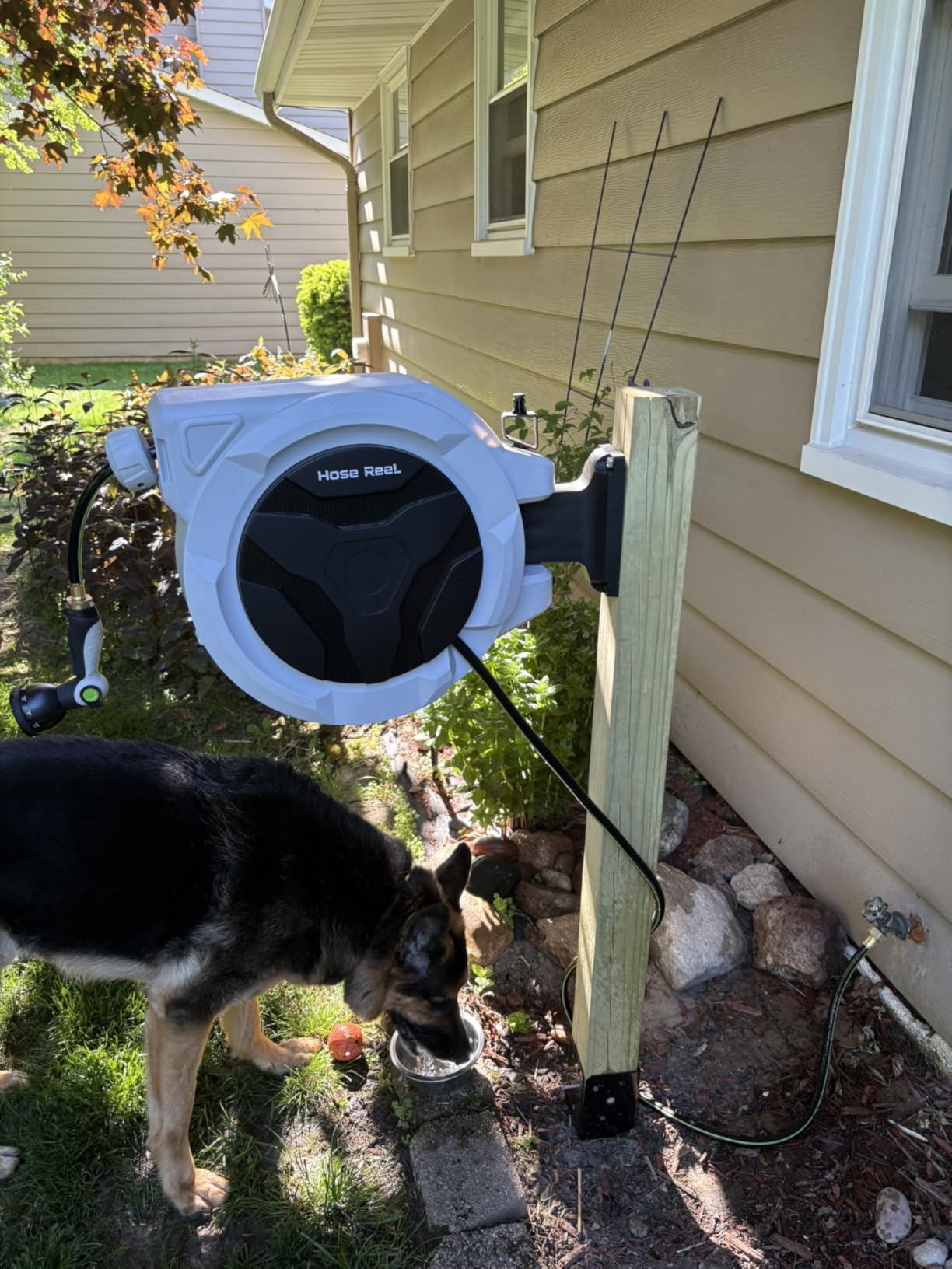 Retractable Hose Reel 1/2 in x 100 ft, Heavy Duty Wall Mounted Garden Hose Reel with 10-Pattern Nozzle, Any Length Lock, Automatic Slow Return System, 180 Degree Swivel Bracket, UV Resistant 2026 Upgraded customer photo 2