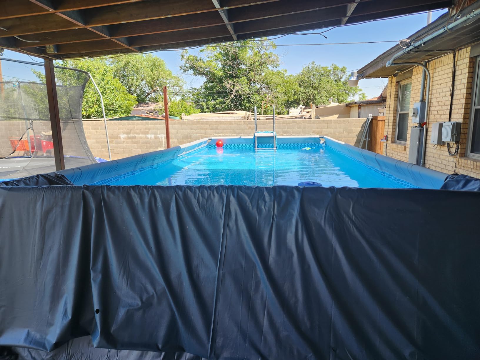 INTEX Ultra XTR 18 ft x 9 ft 52 in Above Ground Pool Set, Rectangular Swimming Pool with Steel Frame, 1500 GPH Sand Filter Pump, Ladder, Cover, & Ground Cloth customer photo 1