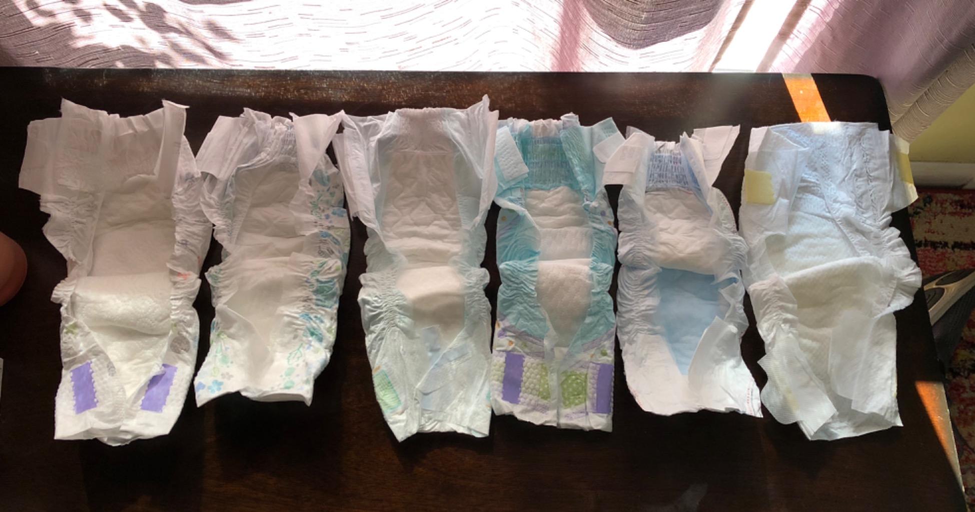 Huggies Size Newborn Diapers, Little Snugglers Baby Diapers, Size Newborn (up to 10 lbs), 31 Count, Packaging May Vary customer photo 1