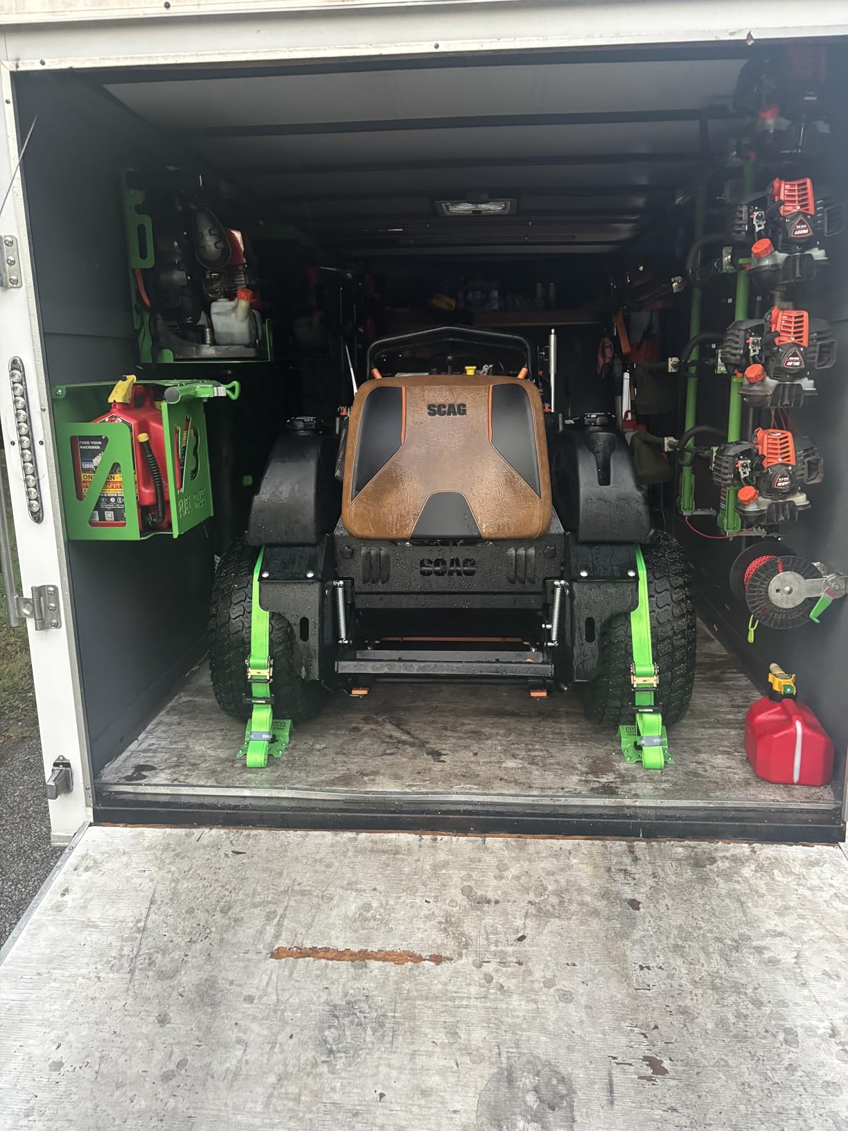 Rhino USA Wheel Chock Tie Down Kit 4,500lb Break Strength (2) Heavy Duty Trailer Tire Ratchet Straps (4) Wheel Chocks - E Track System for ATV, UTV, Lawn Mower Four Wheeler - Green customer photo 1