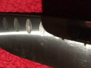 ZWILLING Twin Signature 7-inch Hollow Edge Santoku Knife, Made in Germany customer photo 1