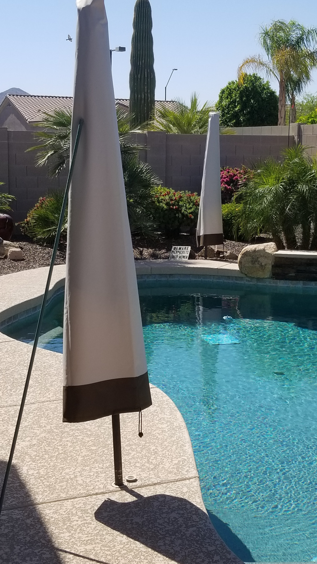 Amazon Basics Outdoor Patio Umbrella Cover, Waterproof Fabric Protects Against Rain and UV, All-Season Protection, Beige/White customer photo 2