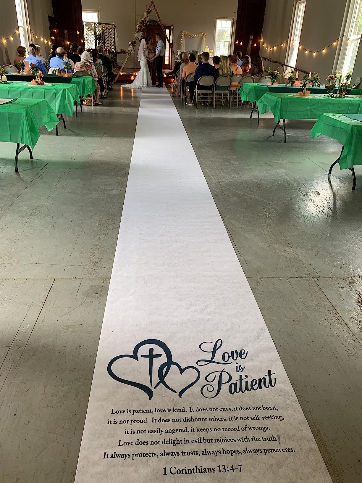 Fun Express Love is Patient Wedding Aisle Runner for Wedding Ceremony - 100 Feet Long White Polyester Carpet Runner | Christian Wedding Decor with 1 Corinthians 13:4-7 Quote for Indoor & Outdoor Use customer photo 1