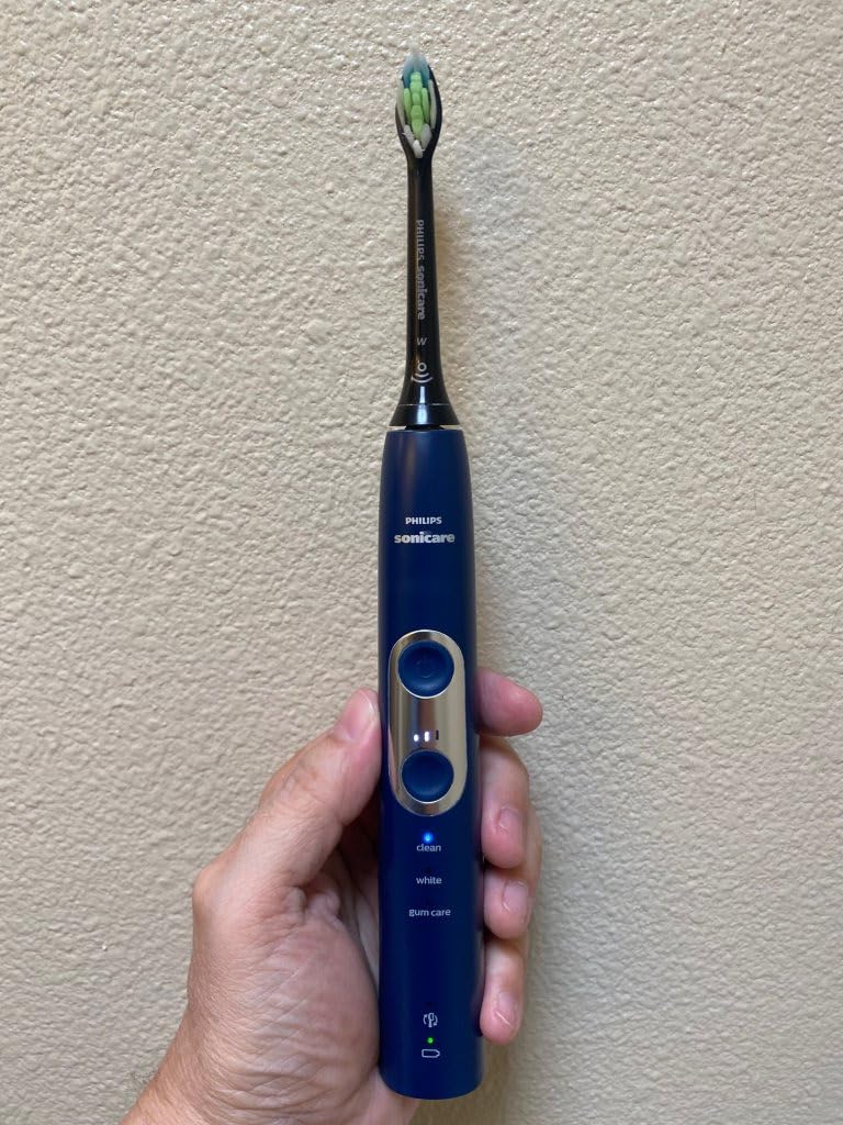 Philips Sonicare ProtectiveClean 6100 Rechargeable Electric Toothbrush, Deep Purple | 700% More Plaque Removal, Visual Pressure Sensor, 9 Brush Settings, 14-Day Battery, QuadPacer, Travel Case, HX6471/03 customer photo 1