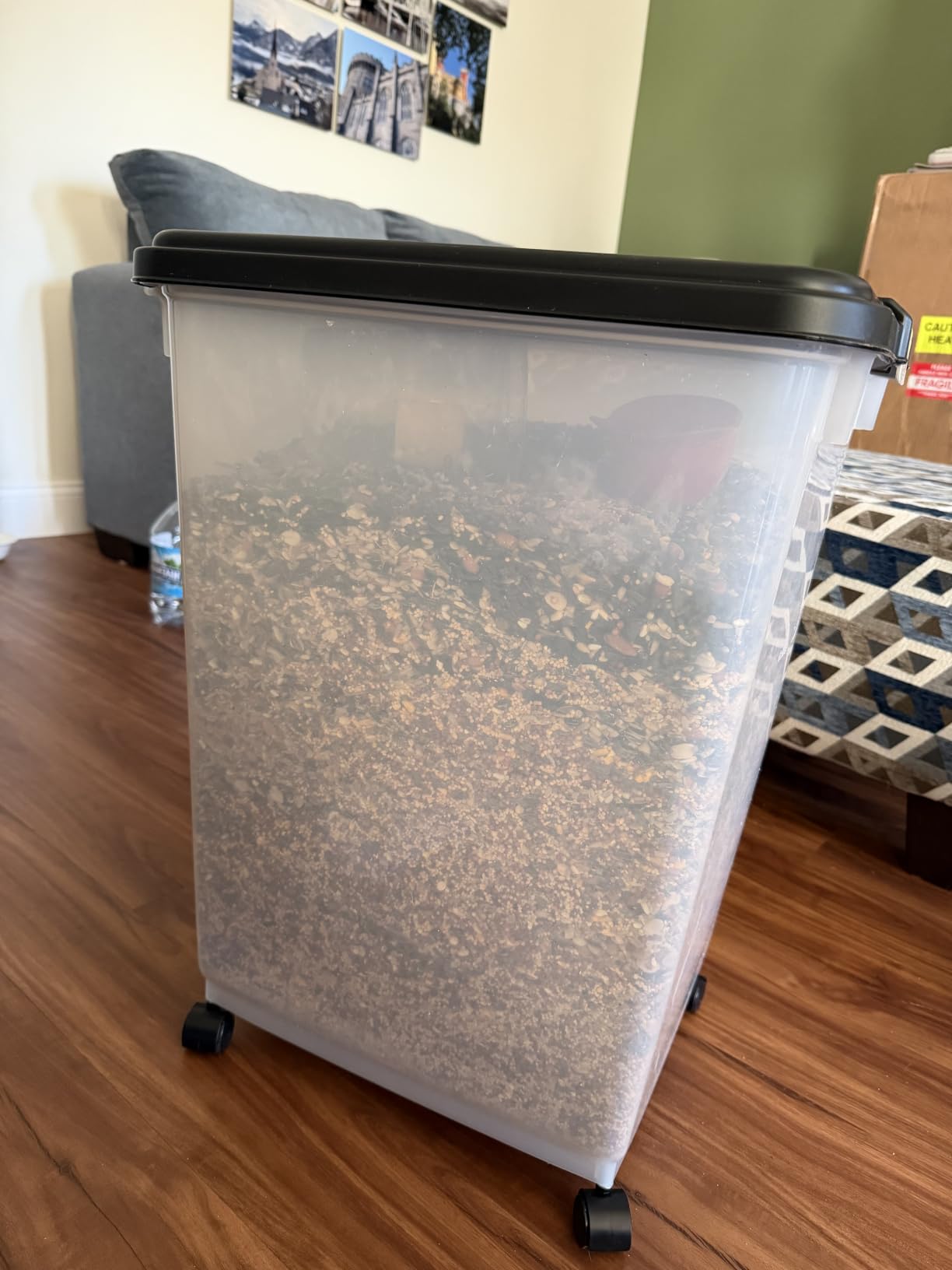 IRIS USA Pet Food Storage Container 25 lbs, Premium 60% Improved Airtight Seal with Air Valve, 2 Cup Scoop, Removable Wheels, Easy to Open - Made in the USA, Black customer photo 1