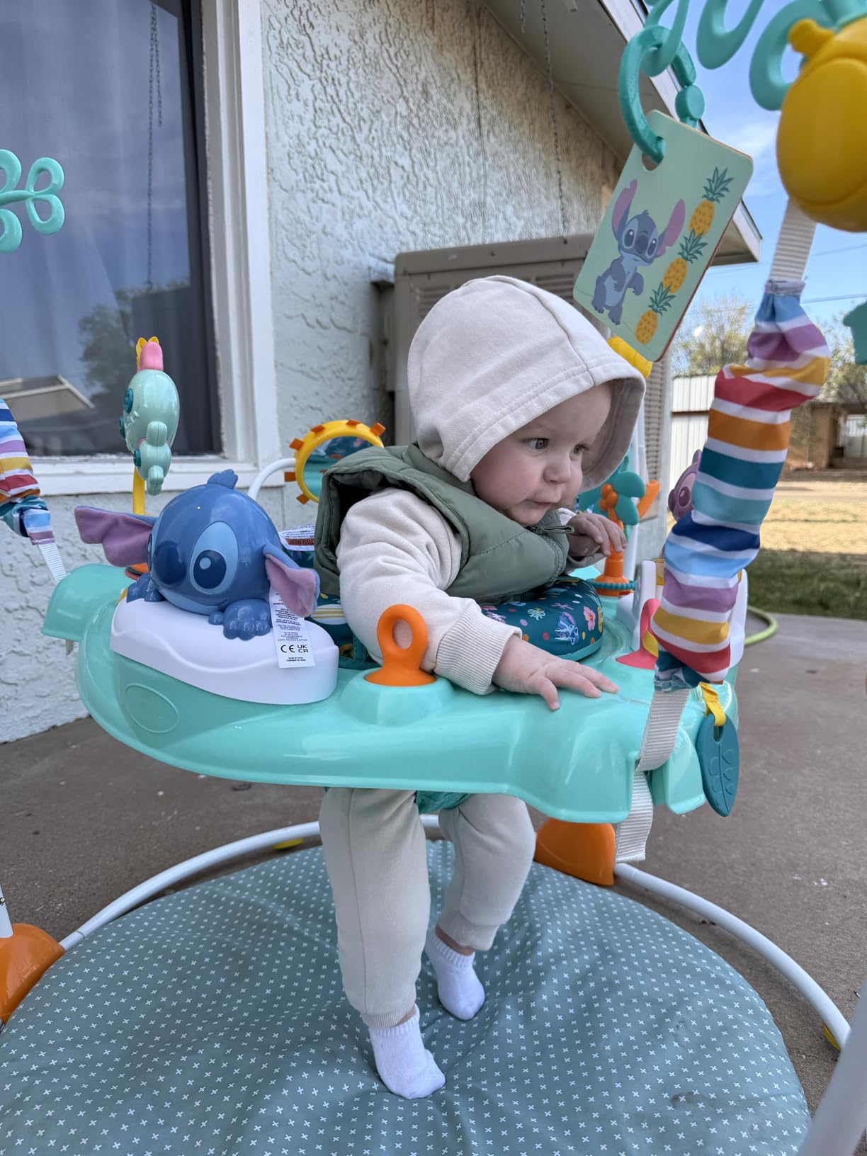 Bright Starts Disney Stitch Little Ohana Baby Activity Jumper with Interactive Toys, Lights & Music with Stitch, Angel & Scrump, 6-12 Months (Blue) customer photo 1