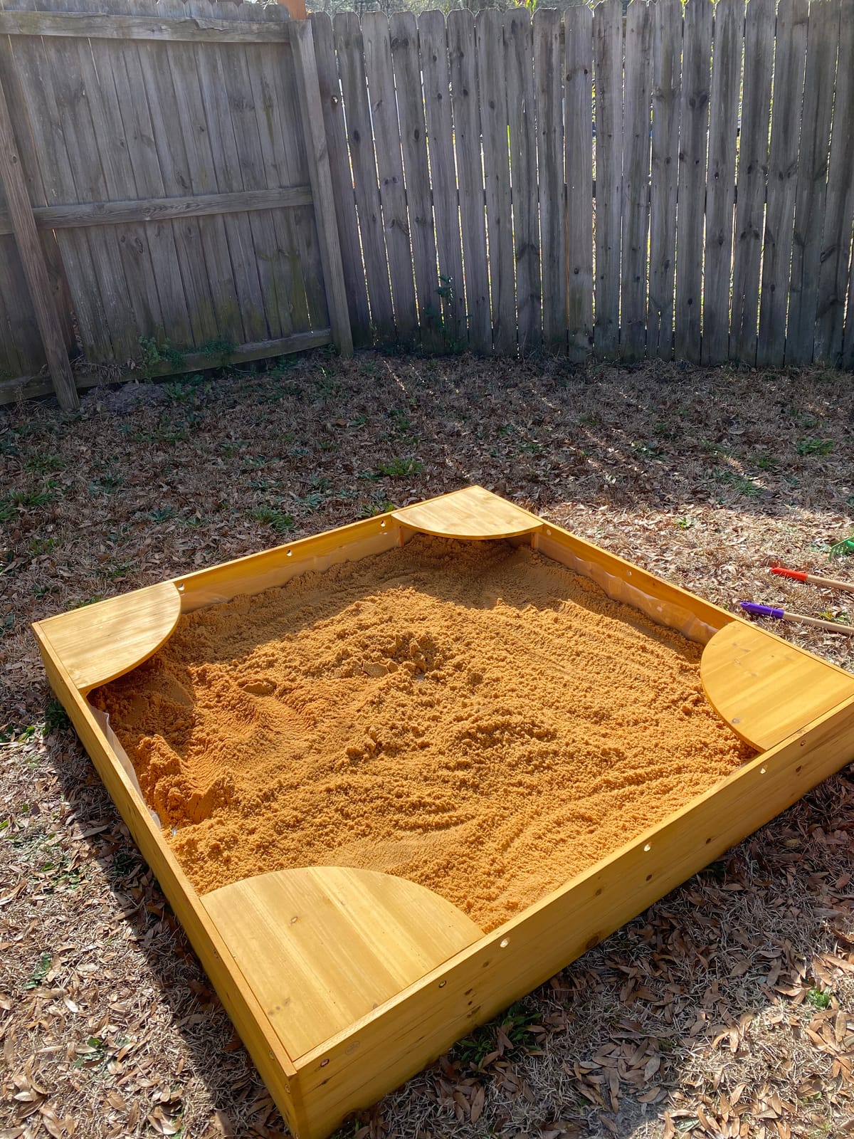 KidKraft Wooden Backyard Sandbox with Built-in Corner Seating and Mesh Cover, Kid's Outdoor Furniture, Honey, Gift for Ages 2-8 customer photo 2