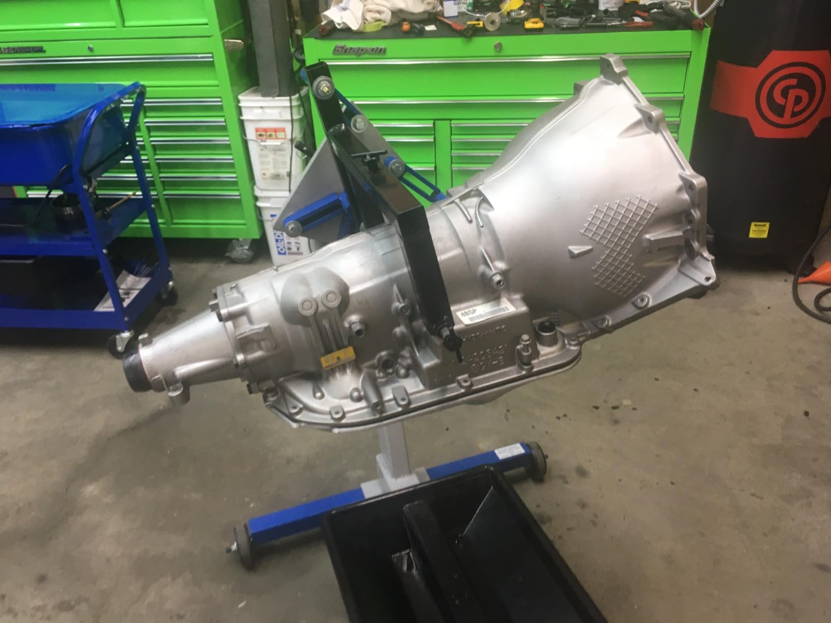 OTC 1726A 1,000 lb. Capacity Engine Stand - 360 Degree Rotation, 8 Lock Positions | Ideal for Passenger Car and Light Truck Engine Rebuilding or Repair; 4 Wheel Design Offers Enhanced Stabililty customer photo 1