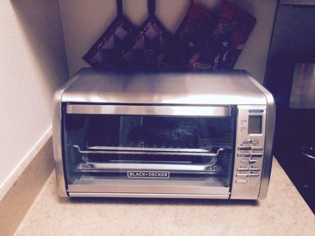 BLACK+DECKER Countertop Convection Toaster Oven, 8 One-touch Cooking Functions, Stainless Steel | Digital convection oven with 8 presets, 120-minute timer and dual rack positions for versatile cooking. customer photo 1