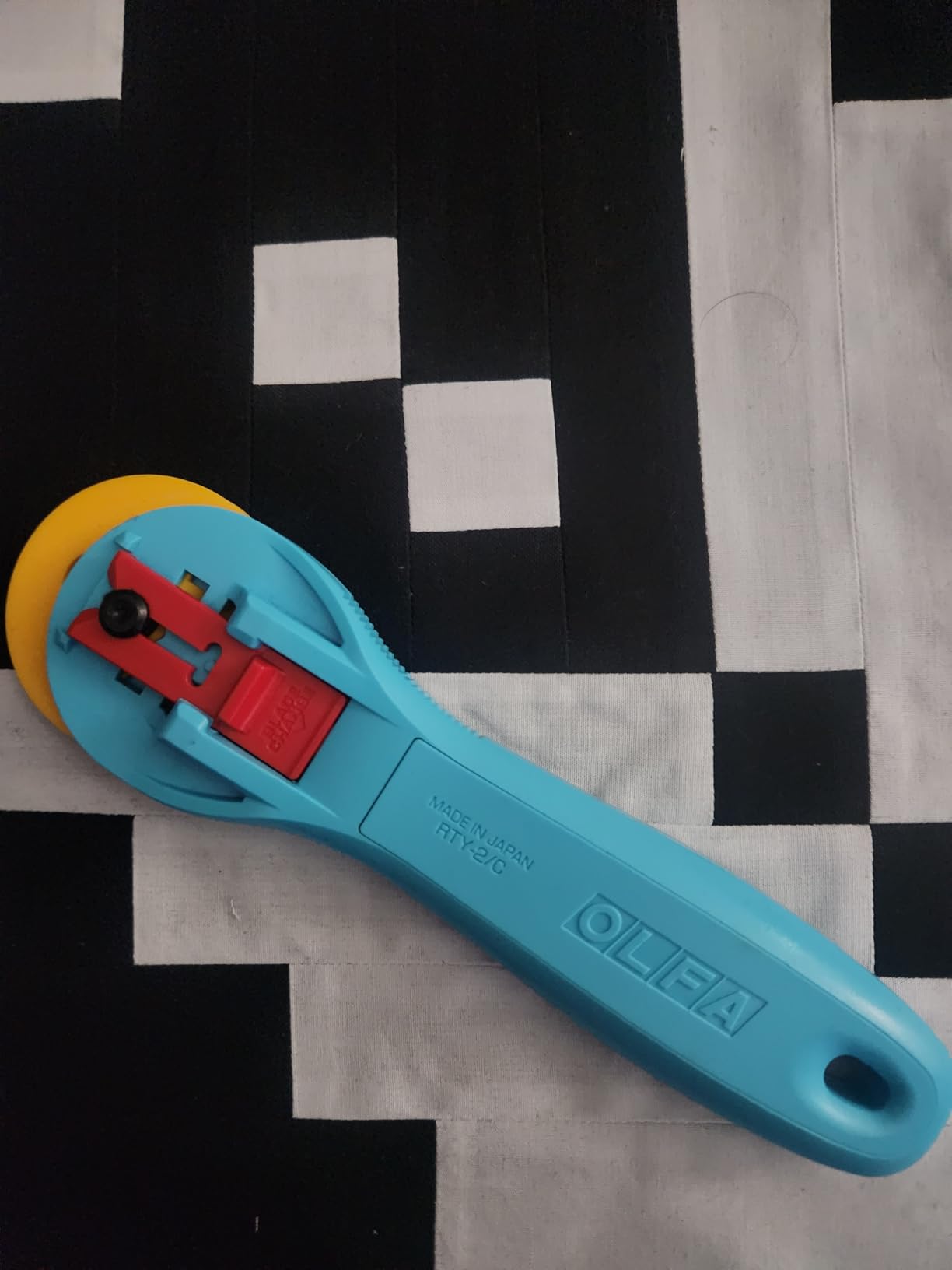 OLFA 45mm Quick-Change Rotary Cutter (RTY-2/C) - Tungsten Blade, Aqua | Integrated finger groove, Easy-slide blade cover customer photo 2