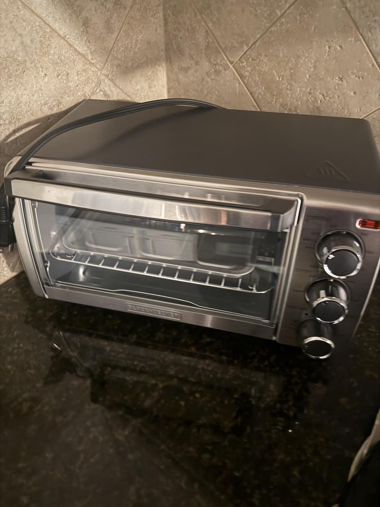 BLACK+DECKER TO1313SBD Toaster Oven, 15.47 Inch, Silver | Compact convection oven fits a 9-inch pizza with timer, stay-on function and removable crumb tray. customer photo 1