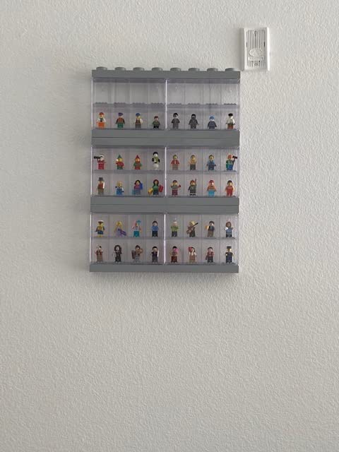 LEGO Minifigure Display Case 16 Black Space for 16 Minifigures | BPA-free large cabinet with 16 individual compartments and baseplates customer photo 1